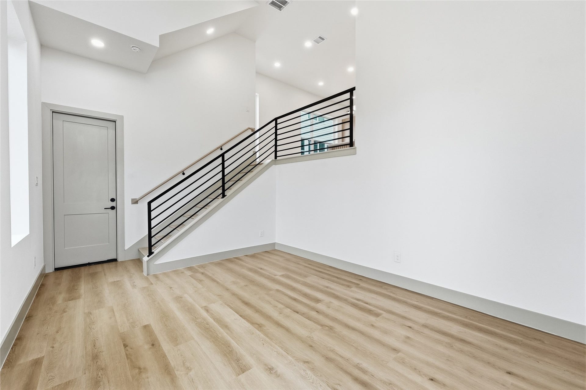 First Floor Living with 20 FT Ceilings