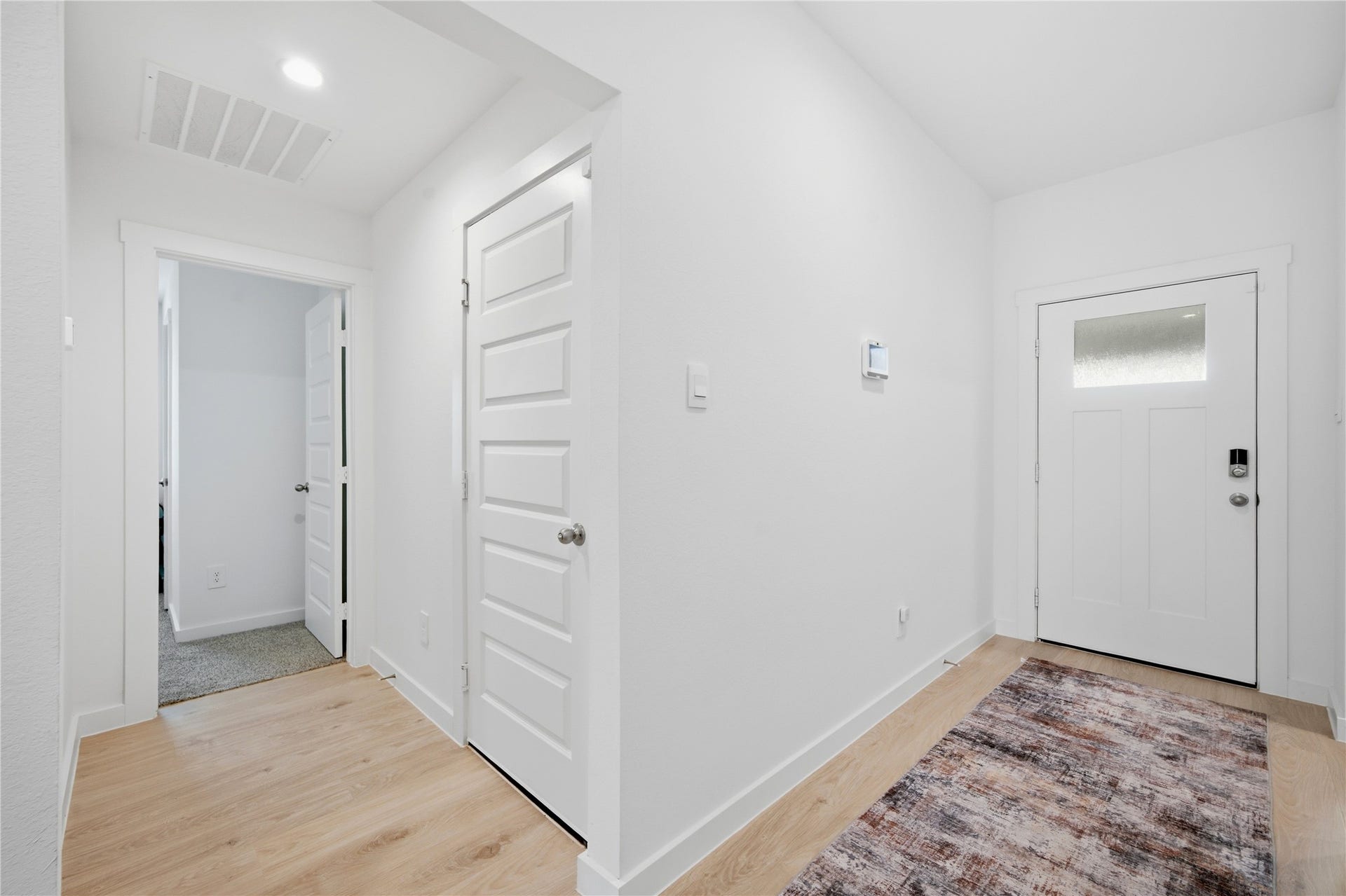 1206 Ricasoli Drive, Richmond, TX 77406 Plus...an additional bedroom and the entrance to the garage to the right. The utility is also along this hallway.