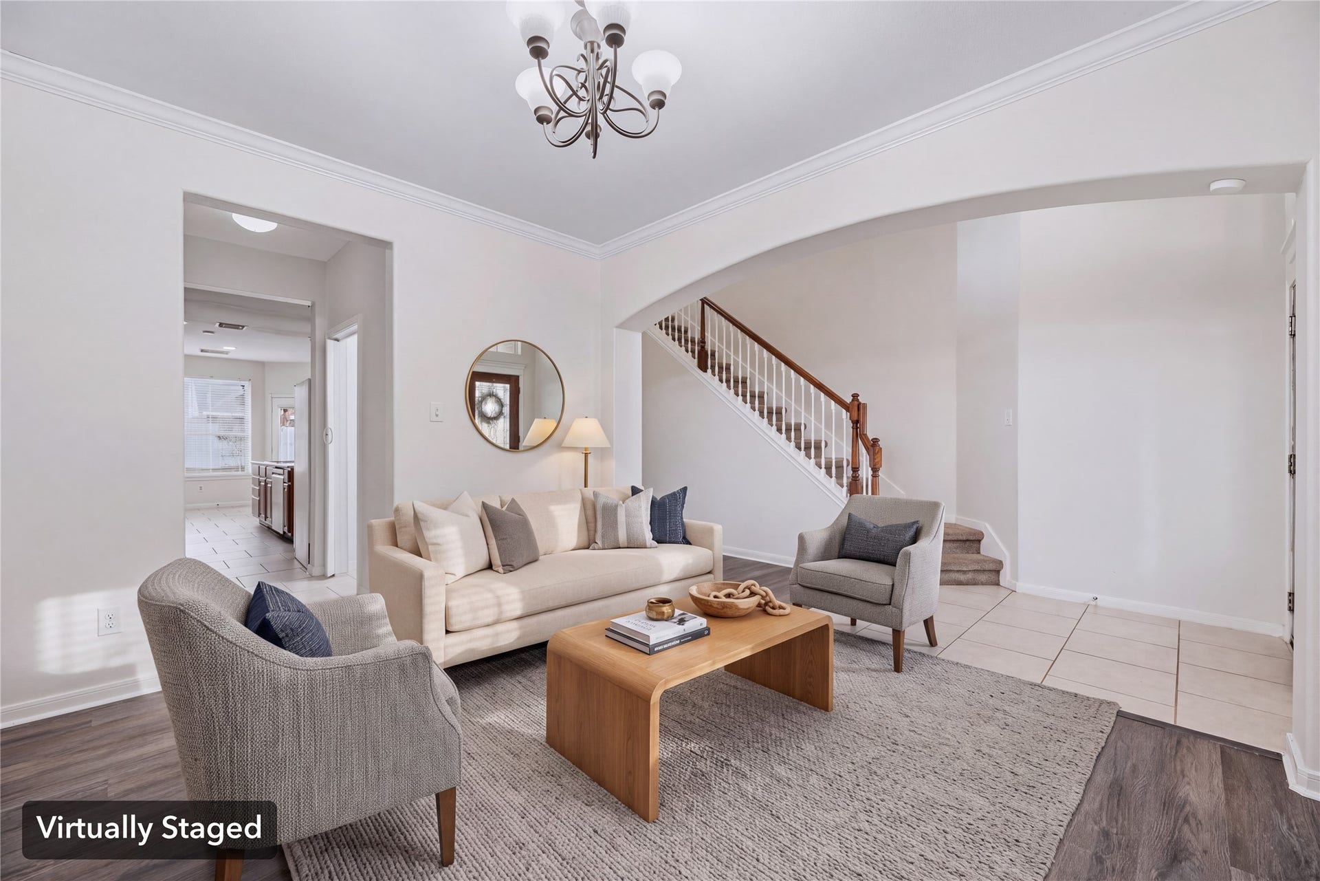 Virtually staged to show a comfortable front sitting area, with an open connection to the foyer. Furniture shown is digital.