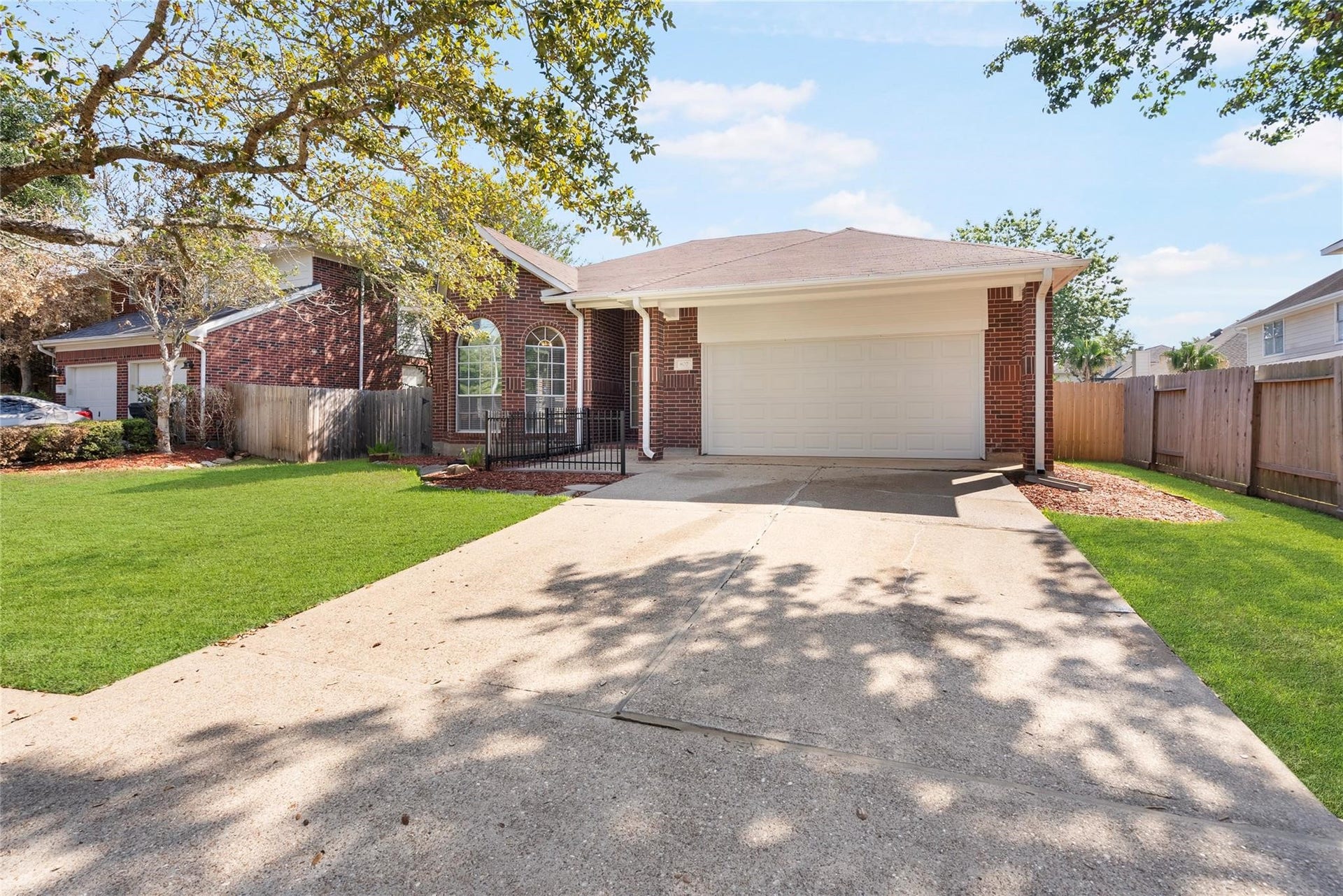 807 Presley Way, Sugar Land, TX 77479 Double wide driveway and 2 car garage offers plenty of parking space.
