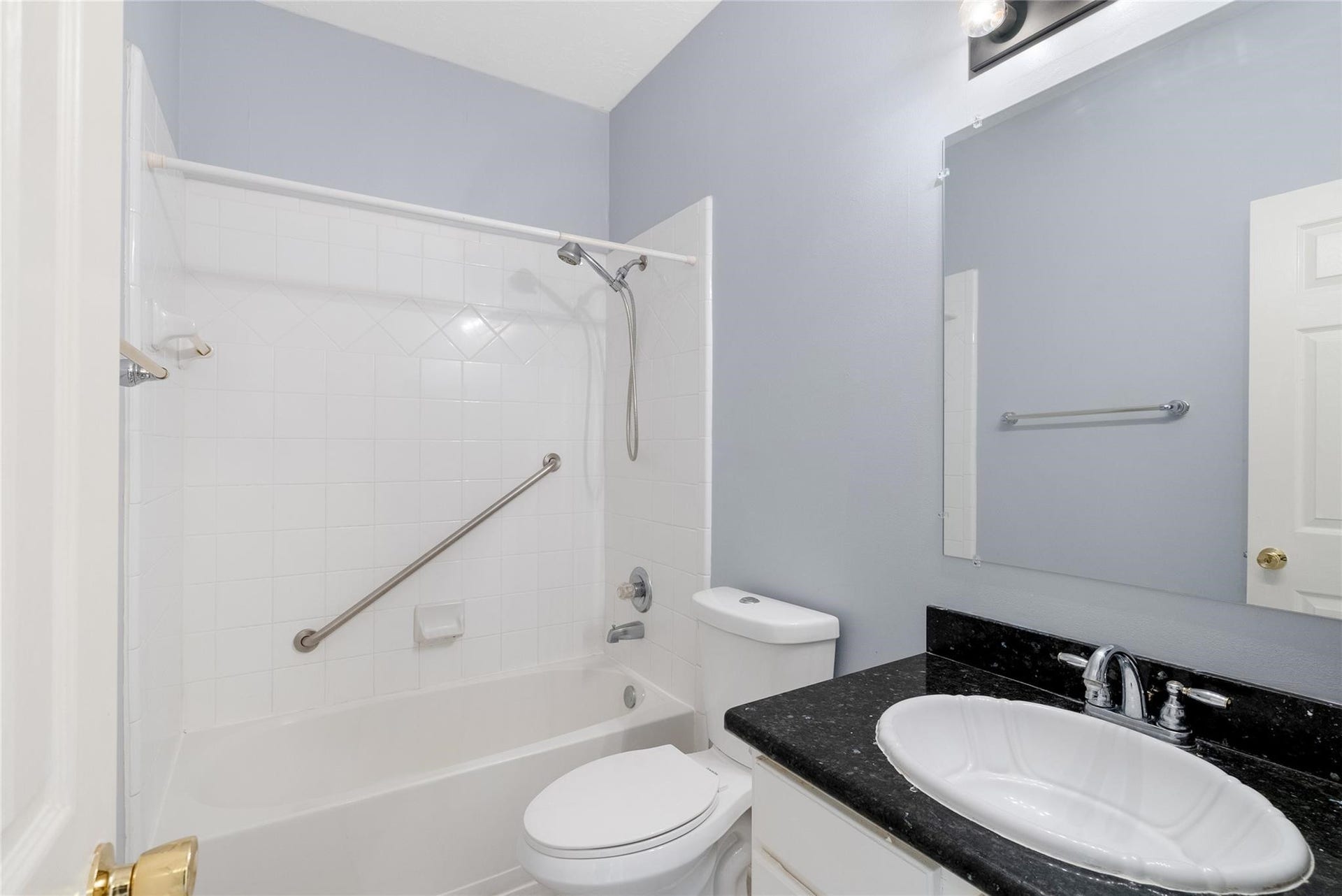 807 Presley Way, Sugar Land, TX 77479 The secondary bathroom has white tile creating a fresh environment!