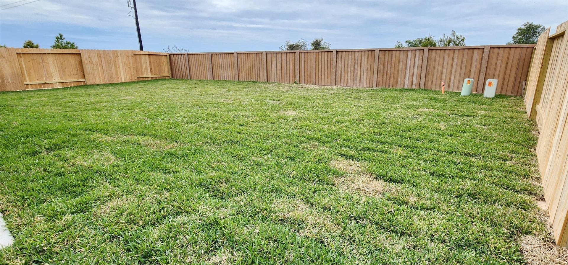 3318 Boothby Bay Lane, Fulshear, TX 77441 Covered Patio to Backyard view