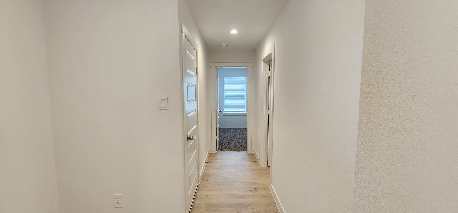 3318 Boothby Bay Lane, Fulshear, TX 77441 Left Hallway to gararge, utility, and bedroom 2