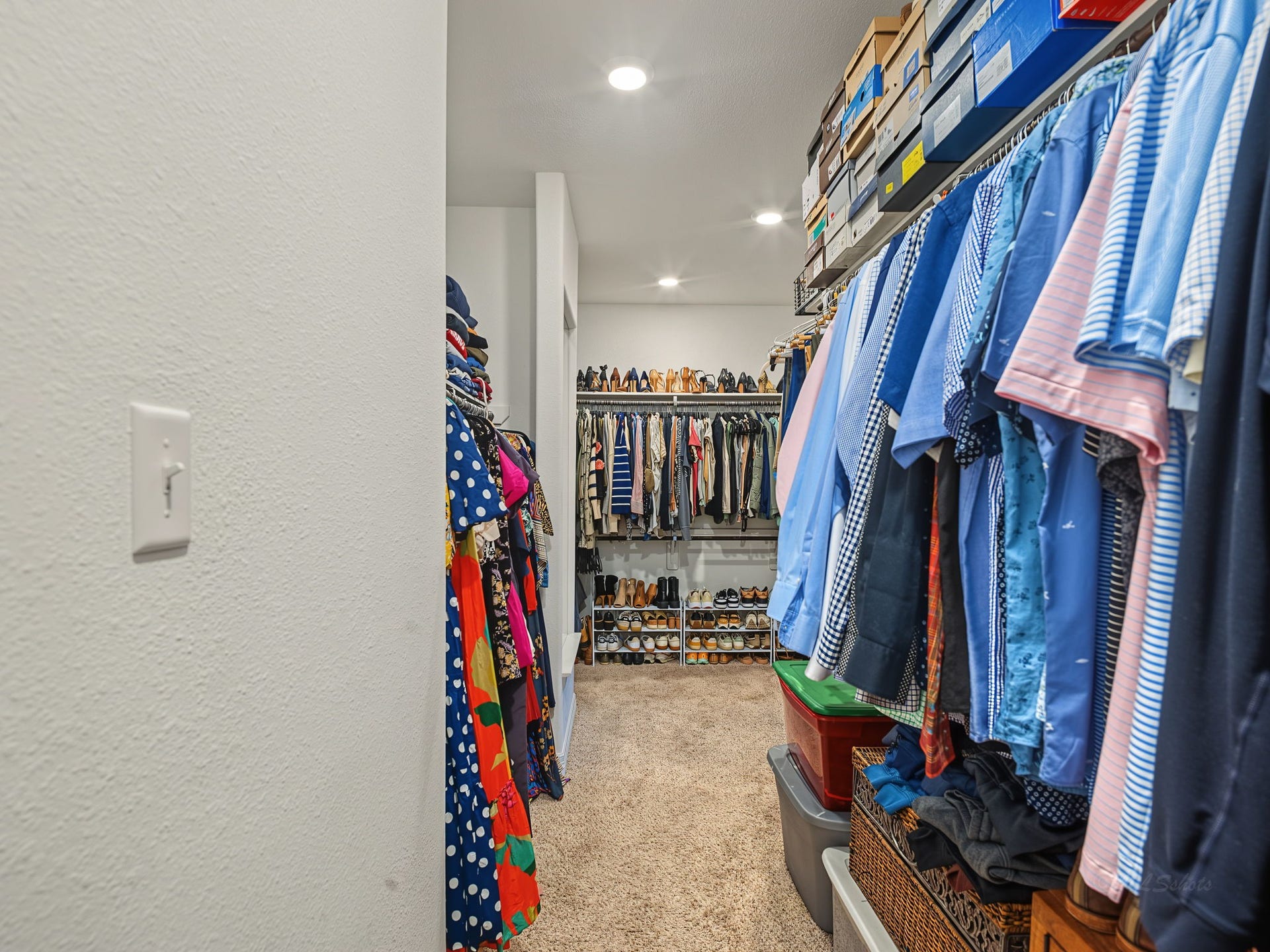 Opposite view of owner's closet.
