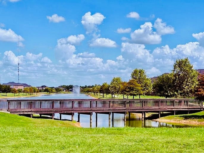 Picturesque view of water and bridge feature.