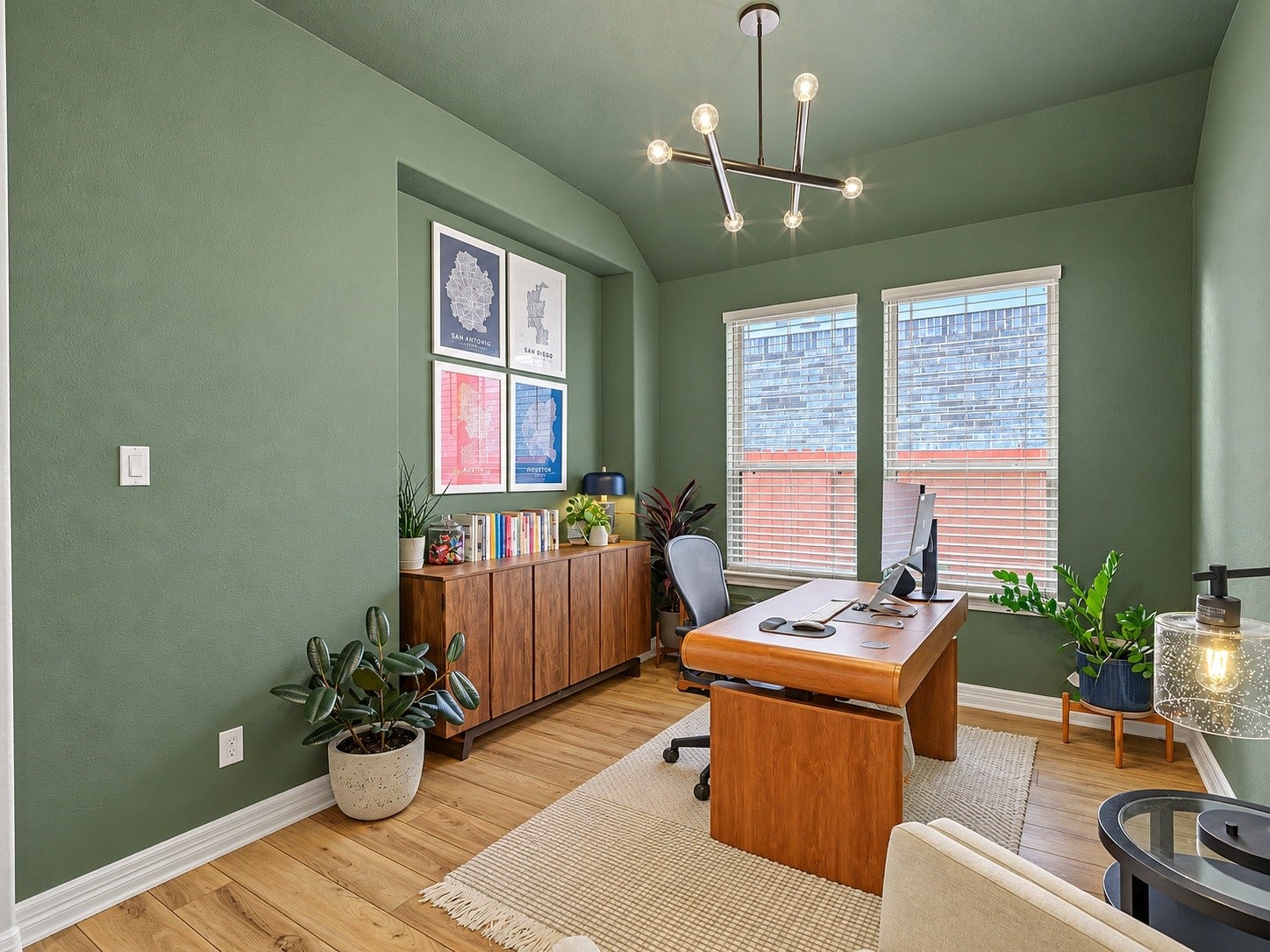 Open flex space offers multiple options for use. Imagine a formal dining room or kids playroom. It could also be a craft room or office space as shown.