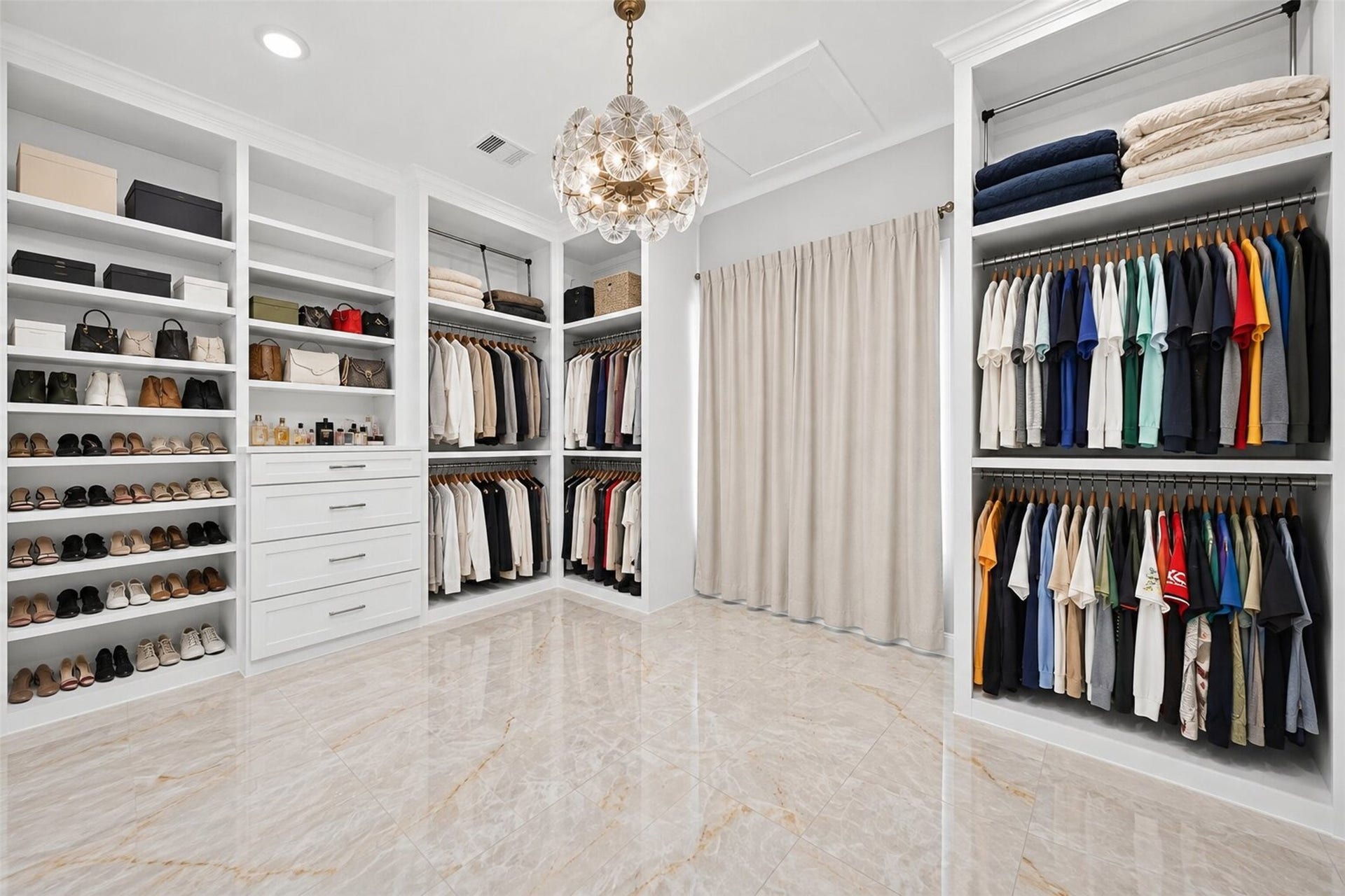 35851 Pineridge Road, Waller, TX 77484 Built-in shelves, drawers, and double hanging rods provide dedicated storage throughout the primary closet.