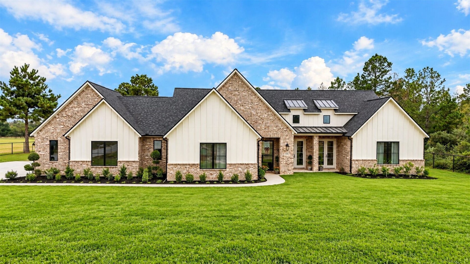 35851 Pineridge Road, Waller, TX 77484 Set beneath a front gable, the recessed entry is framed by brick and light siding, with a walkway leading visitors to the door.