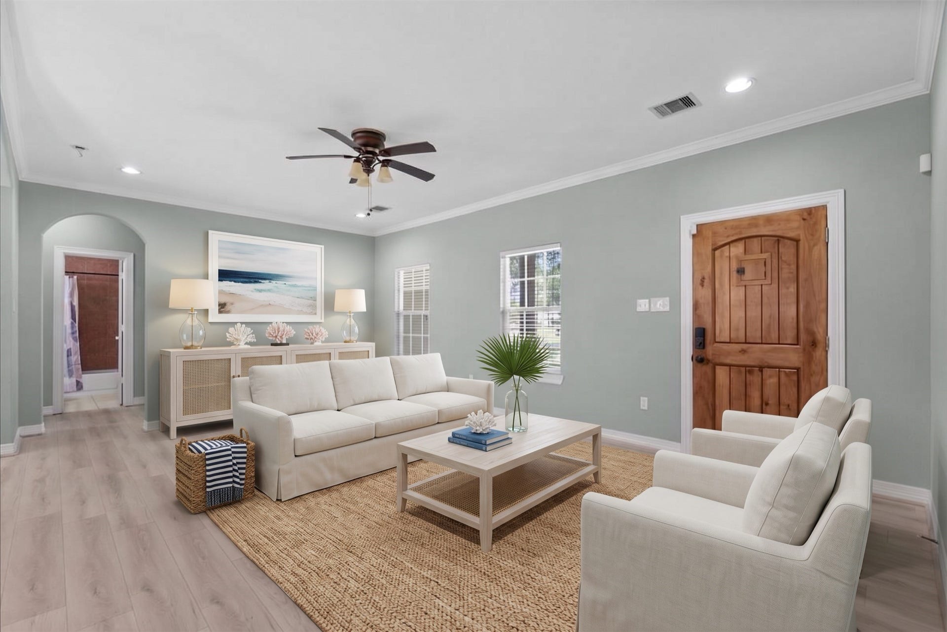 15531 Maple Street, Santa Fe, TX 77517 Crown molding and an arched hallway entry add architectural interest.