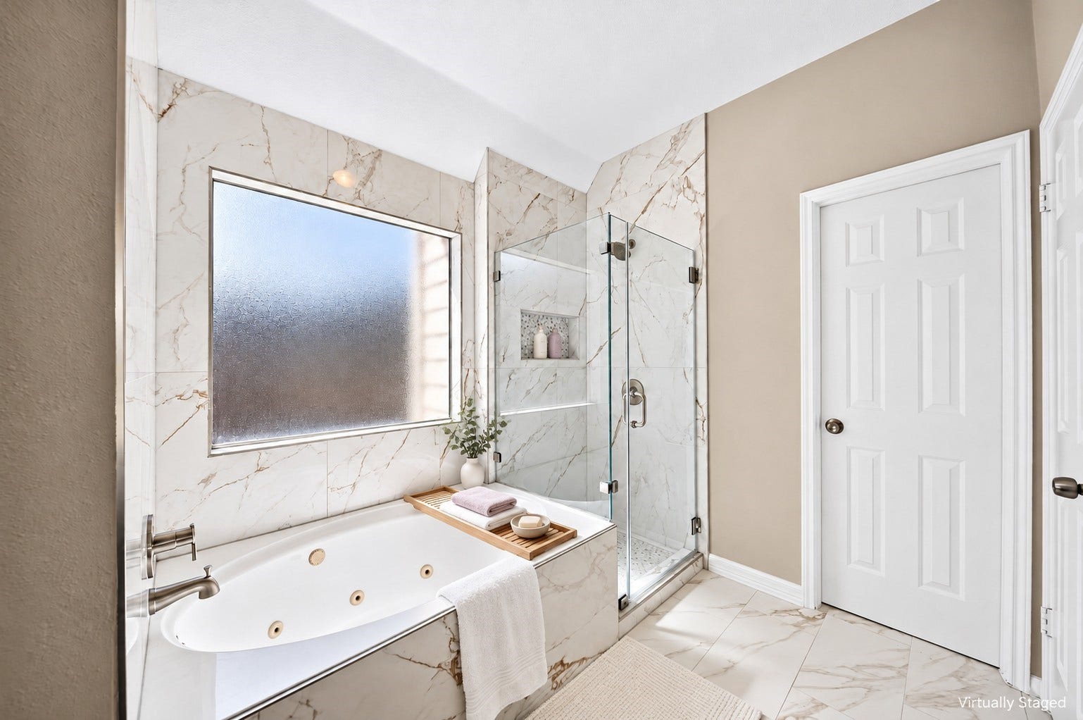 2130 Autumn Fern Drive, Katy, TX 77450 Primary Bathroom Tub & Shower: The beautifully remodeled primary bathroom features a jetted soaking tub, frameless glass shower, recessed niche and a large privacy window.