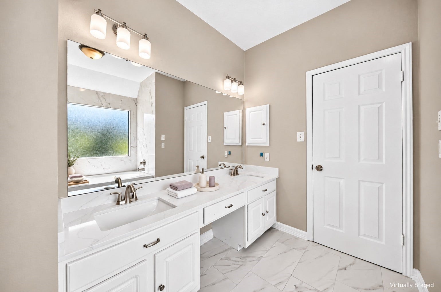 2130 Autumn Fern Drive, Katy, TX 77450 Primary Bathroom Vanity: Elegant double-sink vanity showcases a generous countertop, expansive mirror, modern fixtures and ample cabinetry for storage.