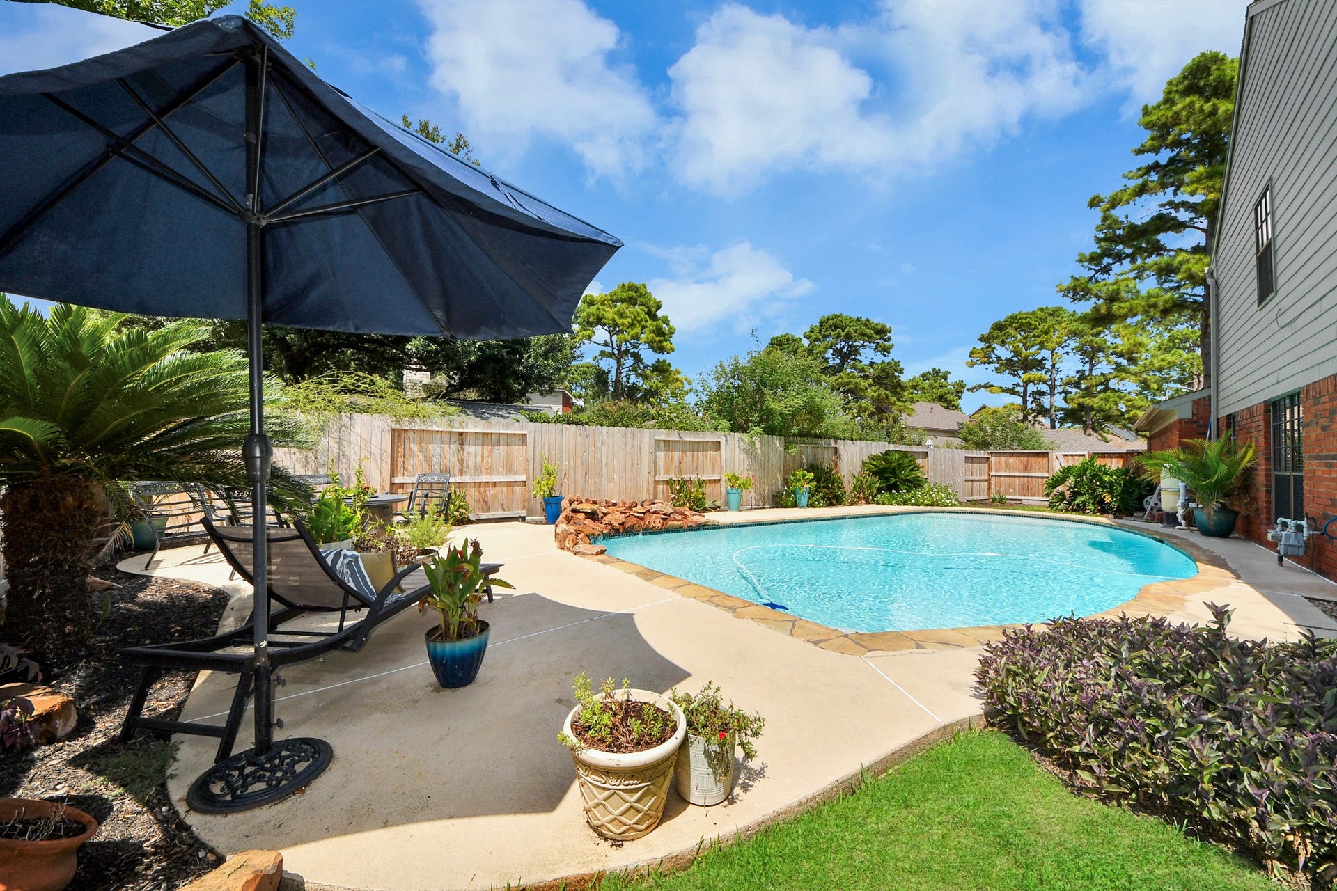 7615 Park Falls Drive, Houston, TX 77095 Sit down, relax, and enjoy your own private backyard oasis
