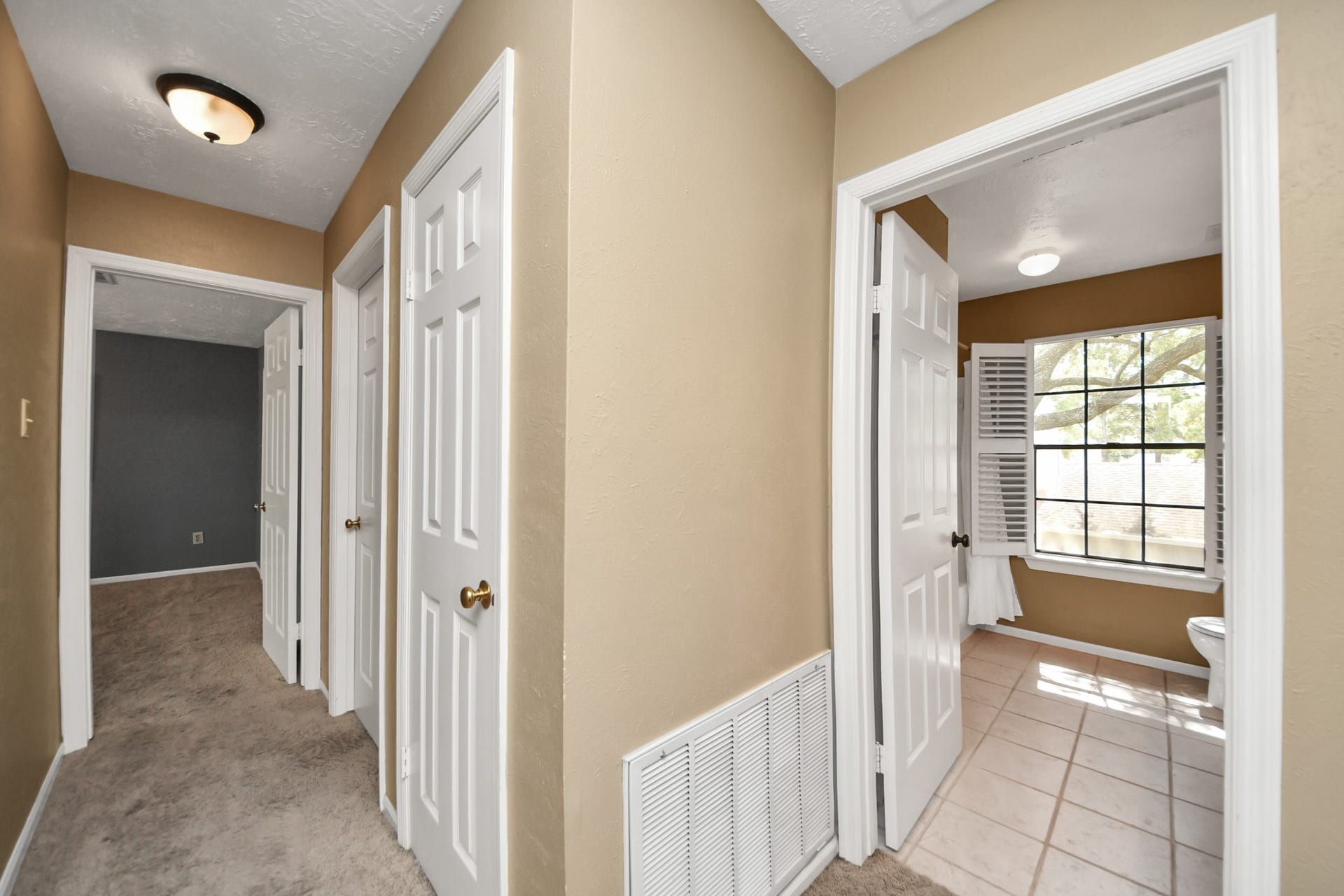 7615 Park Falls Drive, Houston, TX 77095 Secondary bathroom is conveniently located off the hallway for easy access from the additional bedrooms