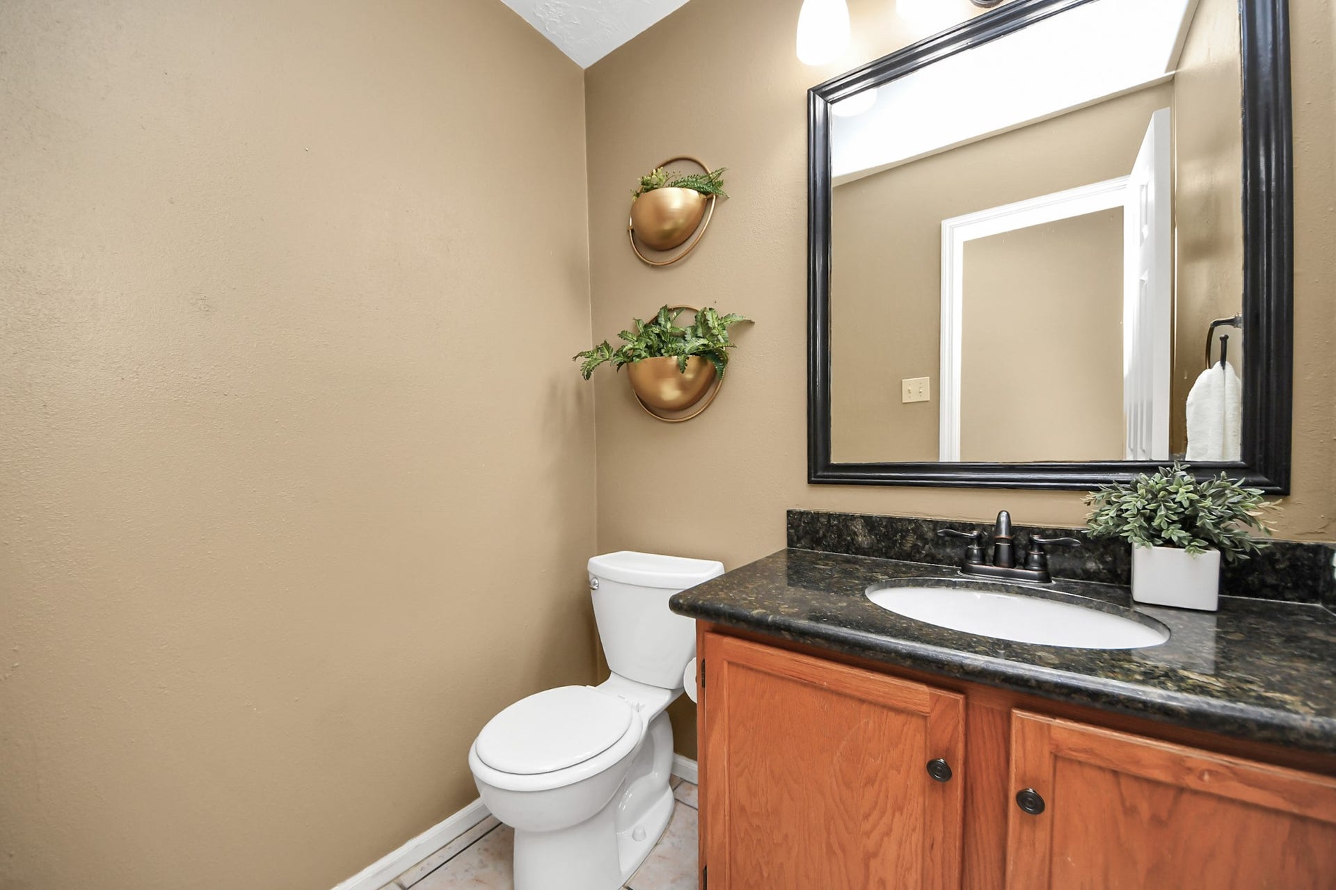 7615 Park Falls Drive, Houston, TX 77095 Convenient powder bathroom located on the first floor