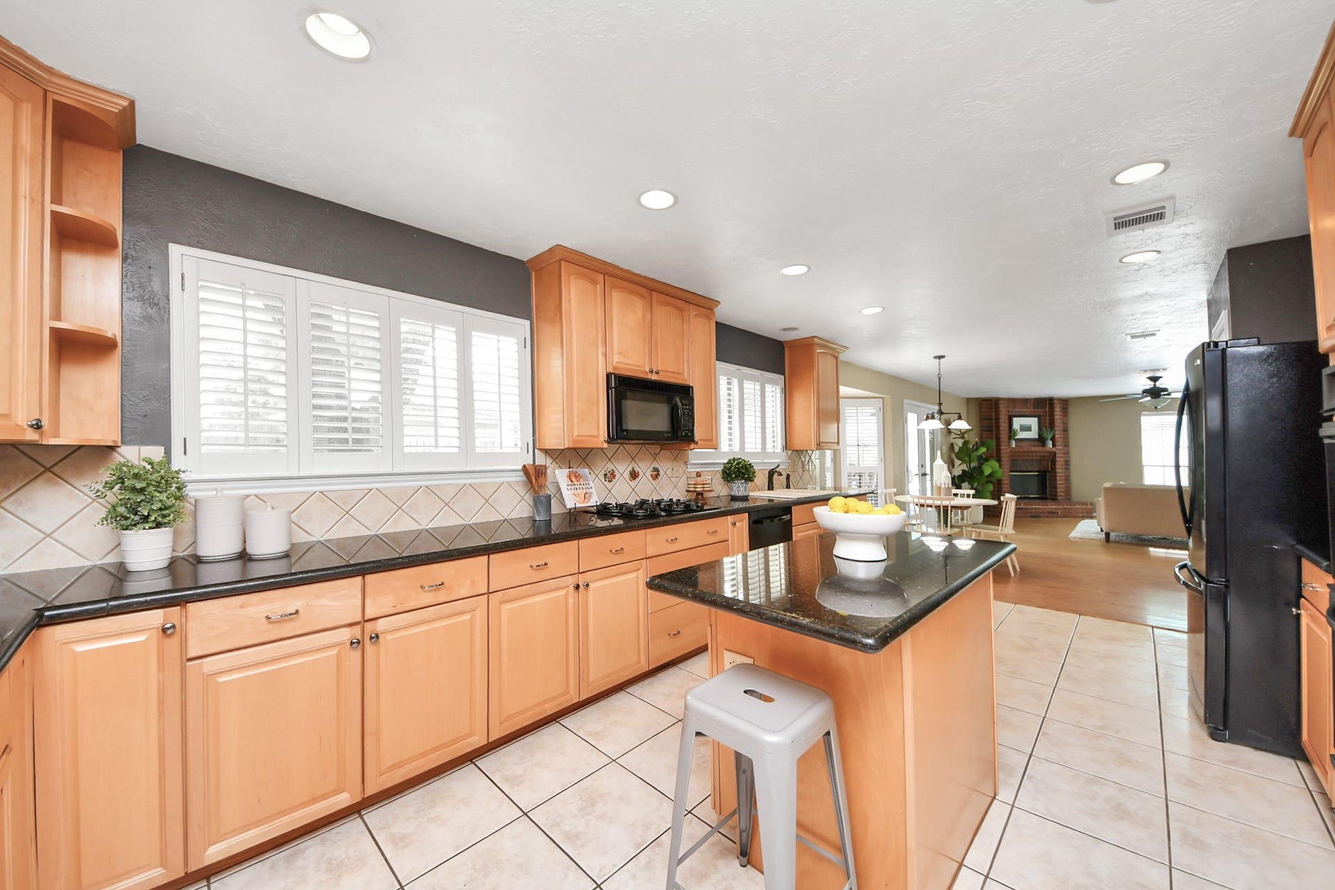 7615 Park Falls Drive, Houston, TX 77095 Large window over the kitchen sink offers a beautiful view of the backyard