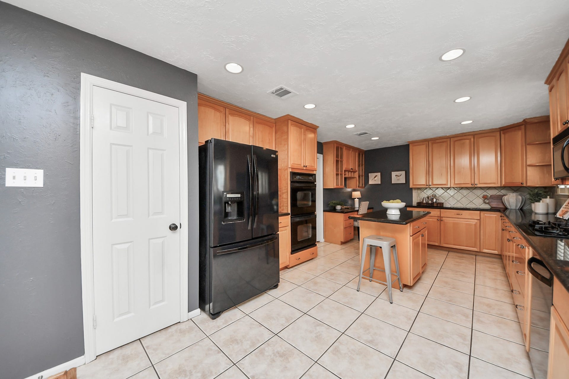 7615 Park Falls Drive, Houston, TX 77095 Pantry and abundant kitchen storage keep everything organized - refrigerator conveys with the home