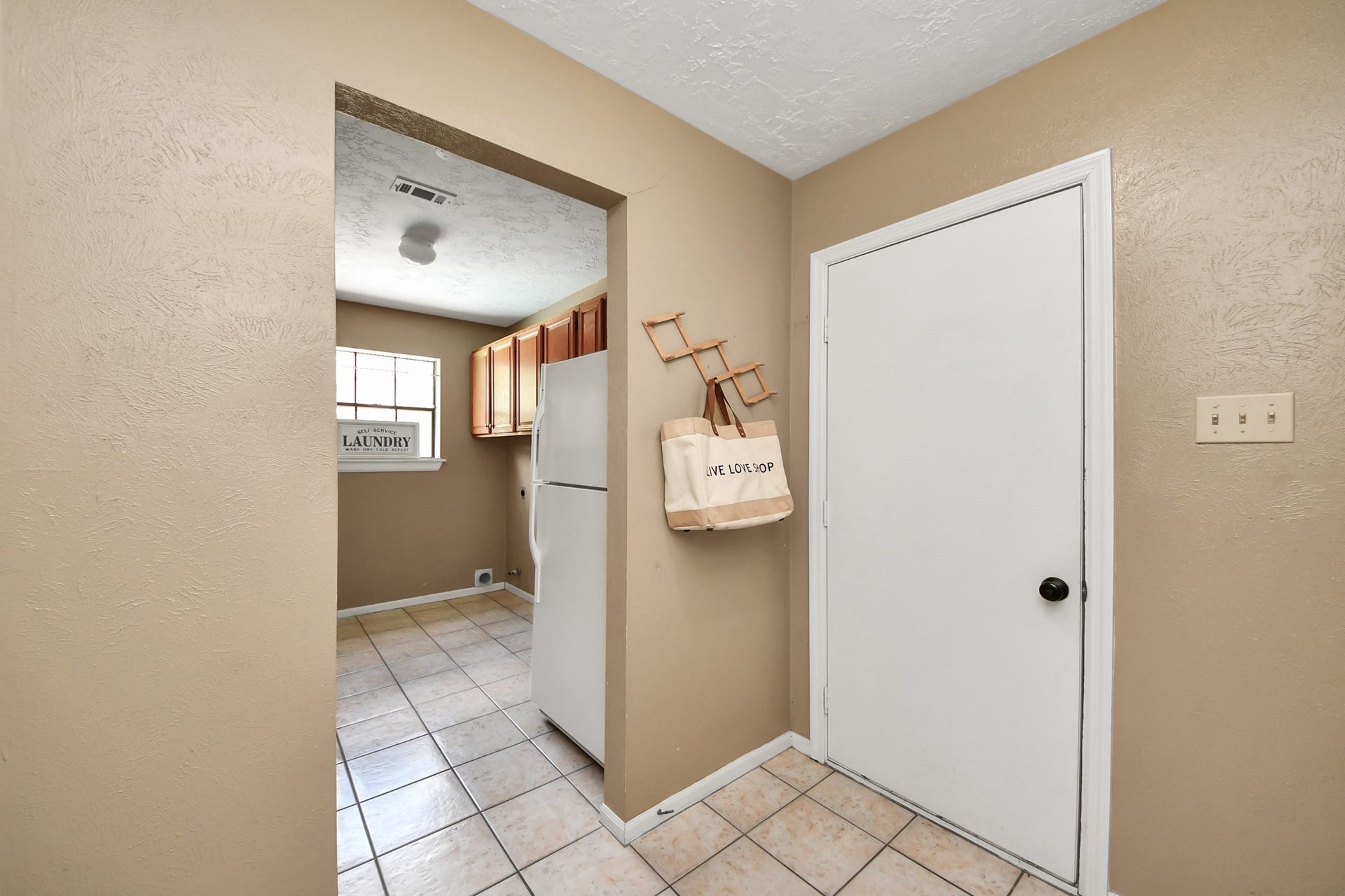 7615 Park Falls Drive, Houston, TX 77095 Convenient access to the attached garage, with the utility area located just to the left