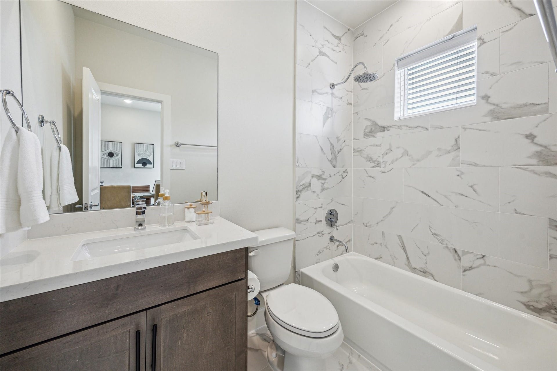 24436 Colonial Commons Drive, Katy, TX 77493 Representative photo showing the communitys model home secondary bathroom. Layout and selections may vary.