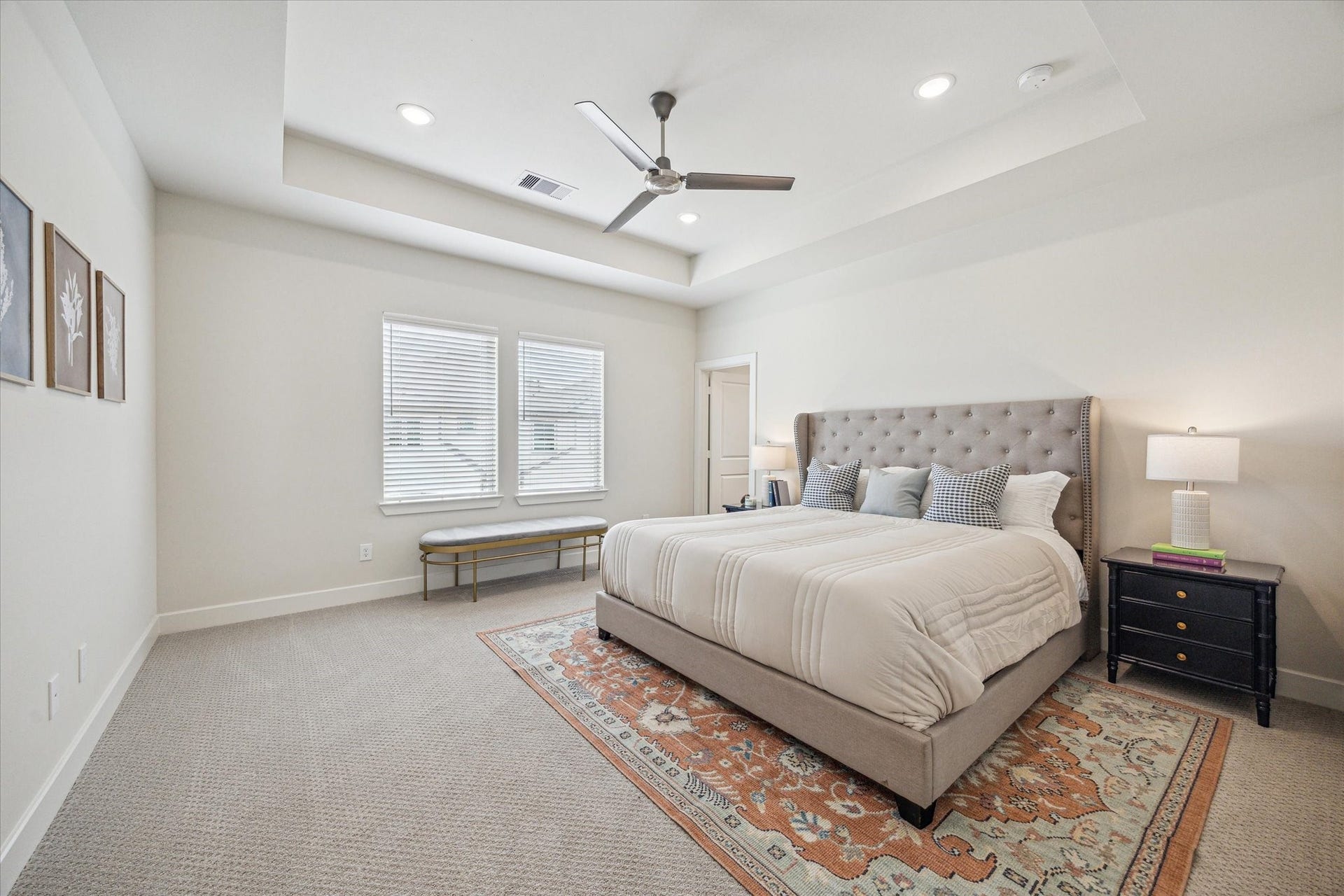 24436 Colonial Commons Drive, Katy, TX 77493 Representative photo showing the communitys model home primary bedroom. Layout and selections may vary.
