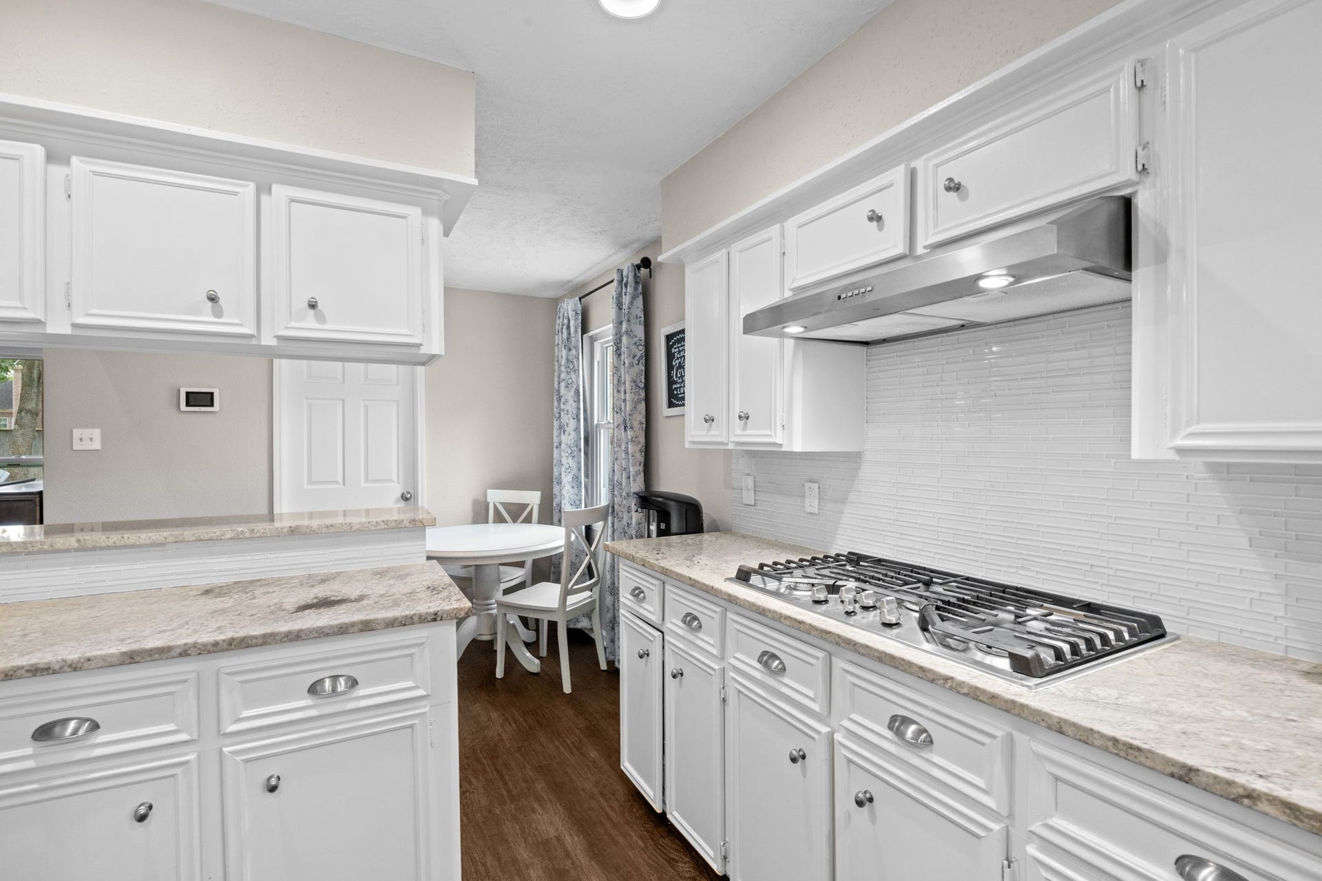13823 Ivymount Drive, Sugar Land, TX 77498 Gas range and beautiful backsplash.