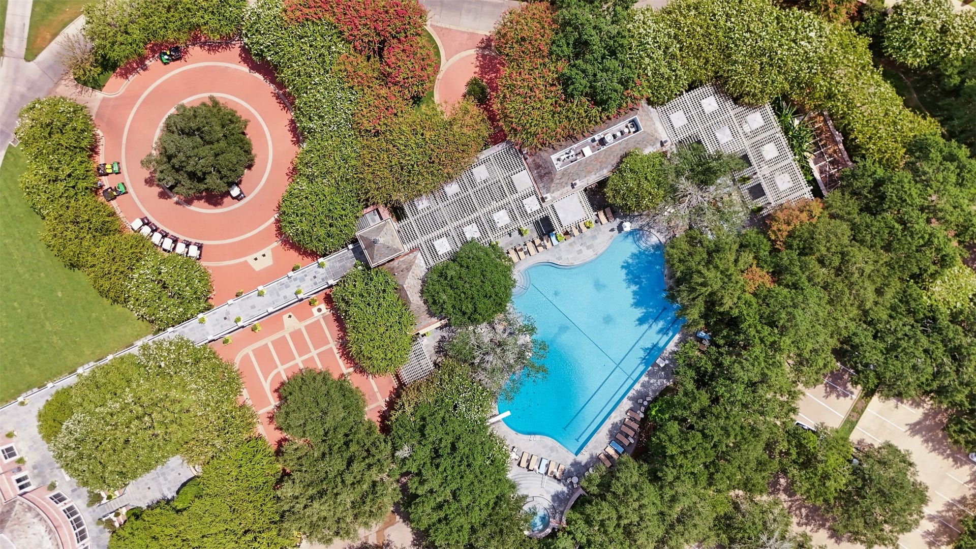 5117 Inverness Drive, Bryan, TX 77802 Aerial view of the Miramont Country Club pool, offering poolside food and beverage service for members and guests.