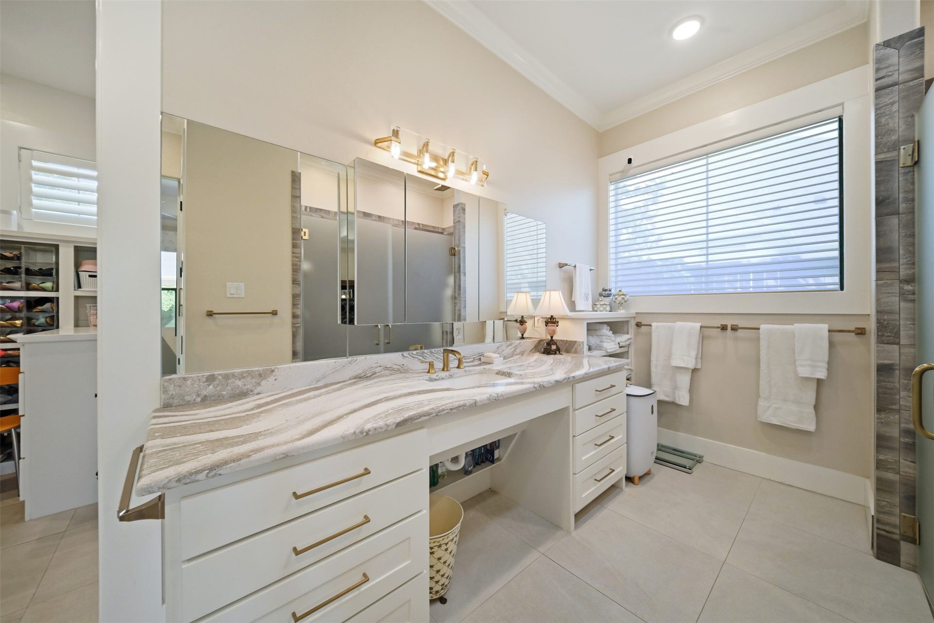 5117 Inverness Drive, Bryan, TX 77802 Second separate vanity in the primary bath offers generous counter space and additional storage.