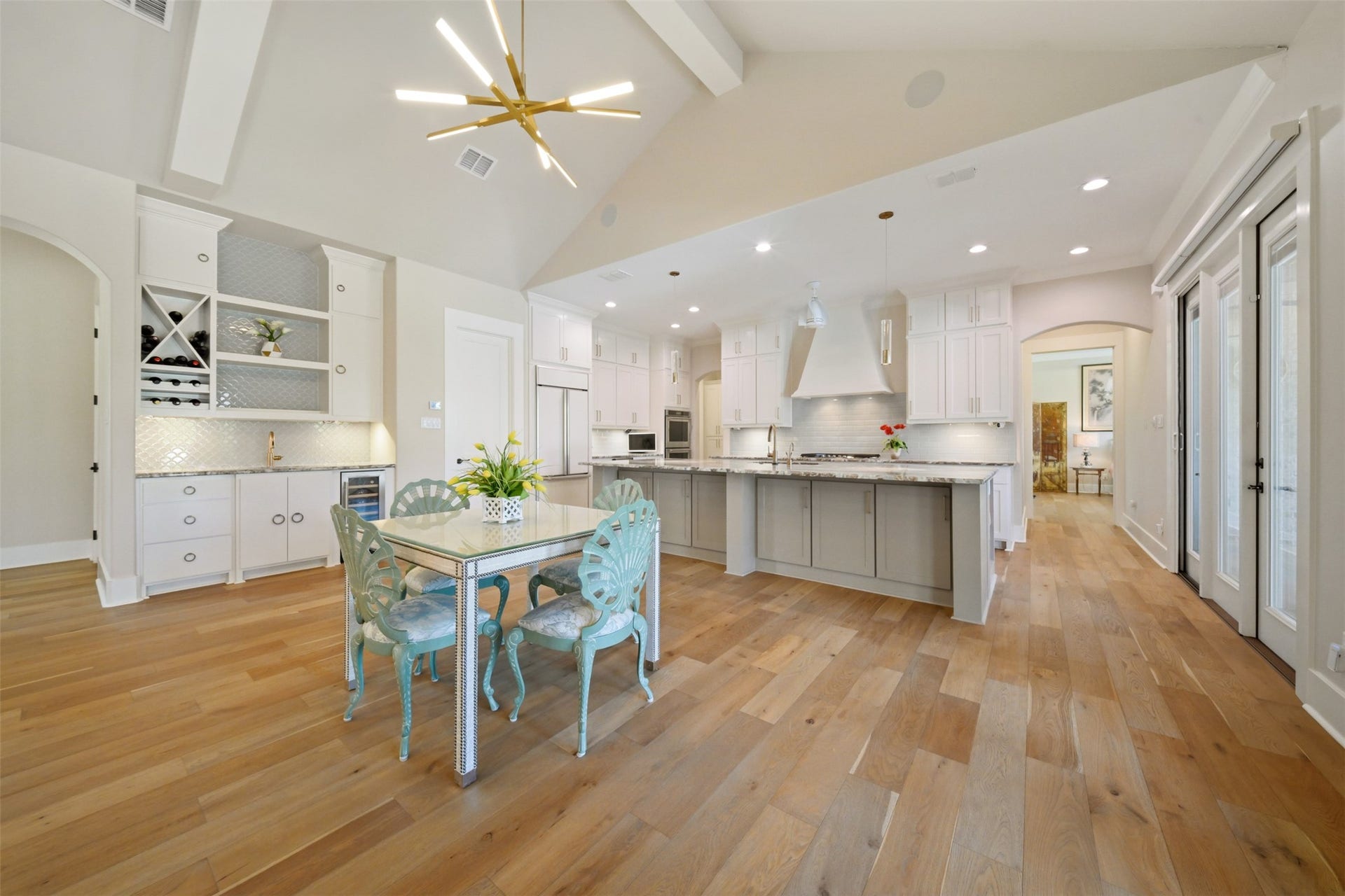 5117 Inverness Drive, Bryan, TX 77802 Generous dining area conveniently located between the kitchen and wet bar, with an oversized island offering additional bar seating.