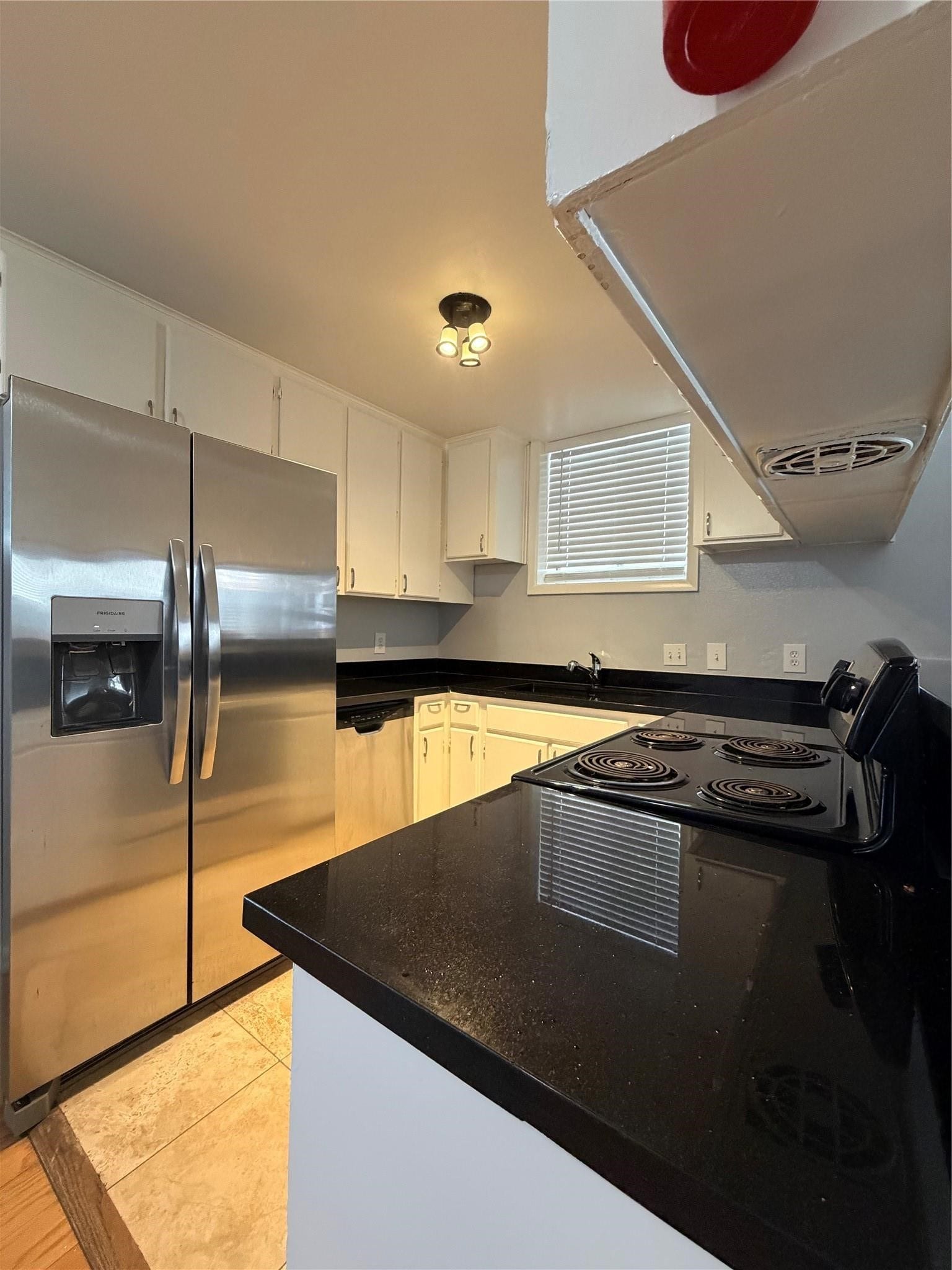 Great kitchen with stainless steel refrigerator