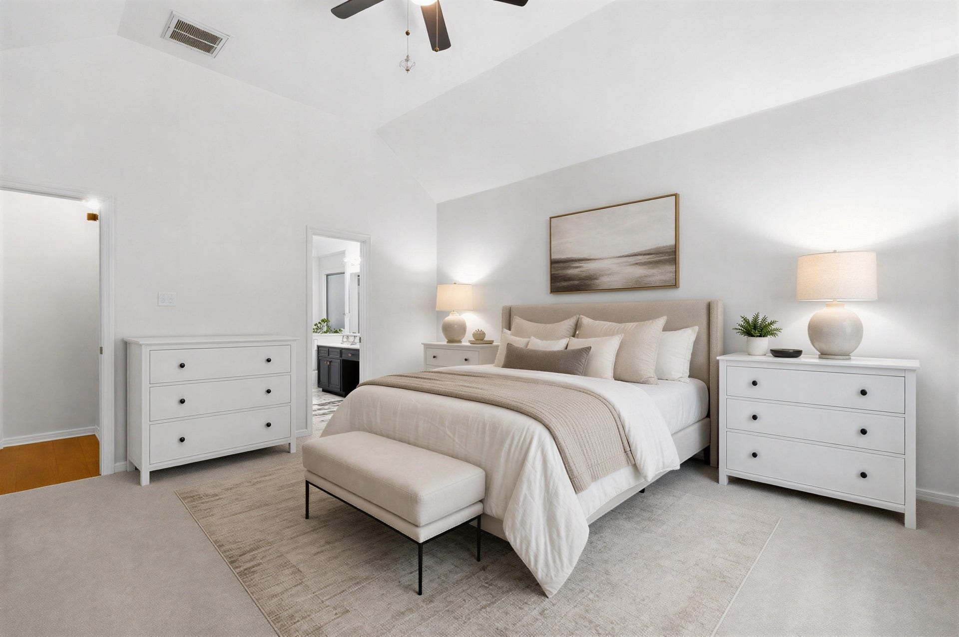 34019 Conroe Huffsmith Road, Magnolia, TX 77354 Elegant bedroom with soft neutral tones, featuring a plush bed, matching nightstands, and ample natural light.