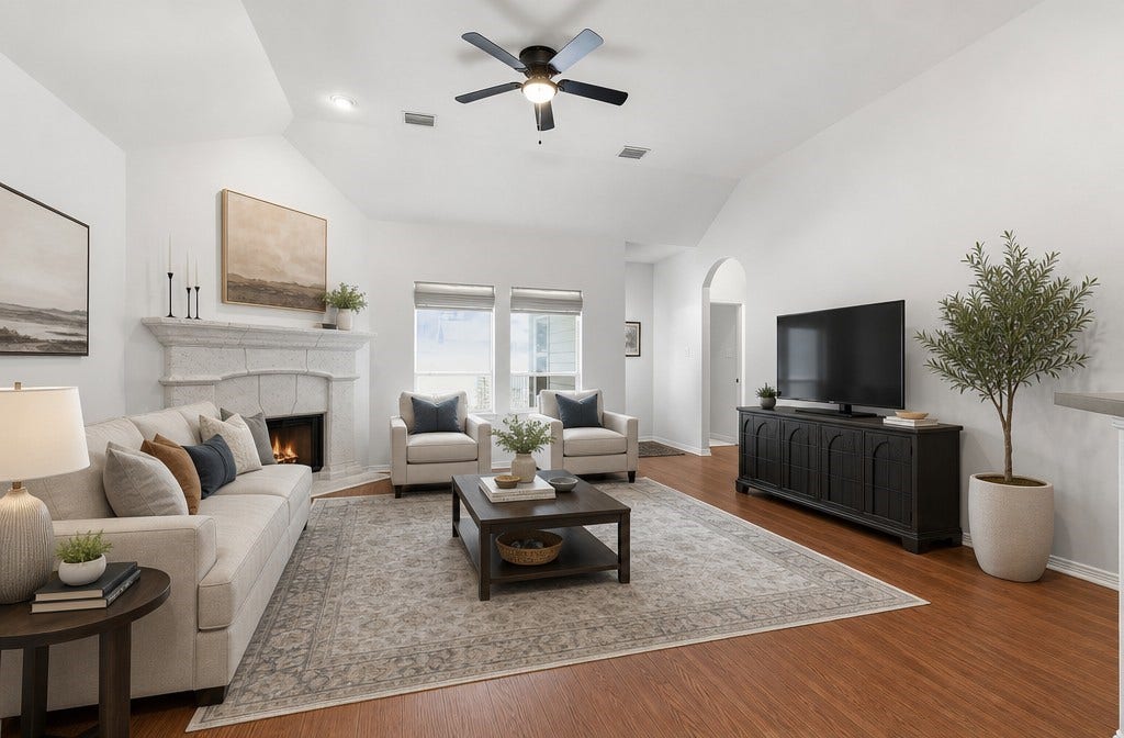 34019 Conroe Huffsmith Road, Magnolia, TX 77354 Spacious living room with high ceilings, elegant fireplace, and abundant natural light, featuring cozy seating and modern decor.