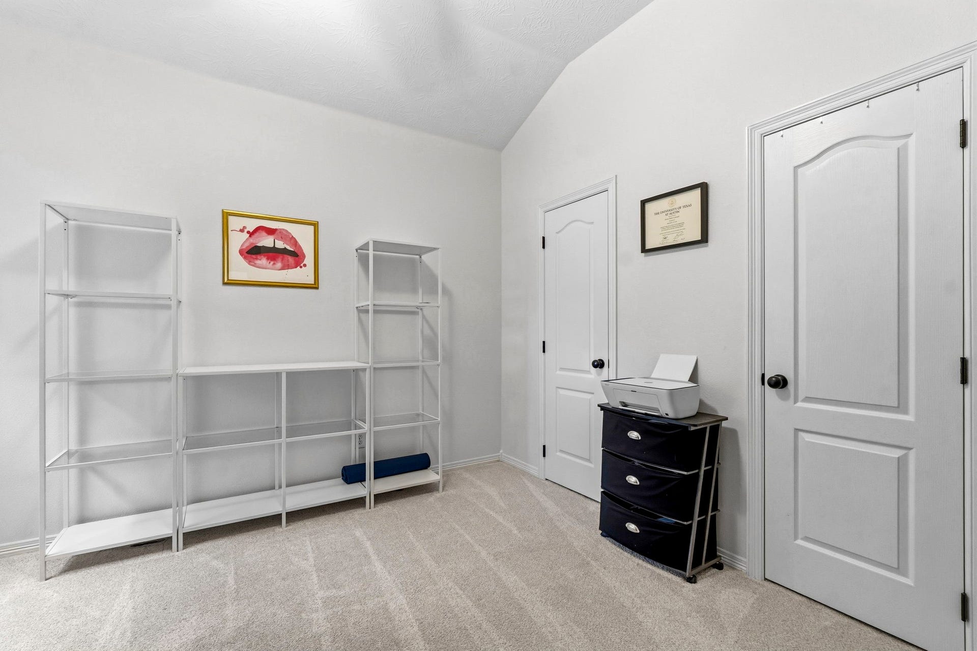 34019 Conroe Huffsmith Road, Magnolia, TX 77354 Bright, versatile room with ample shelving and storage, perfect for a home office or study.