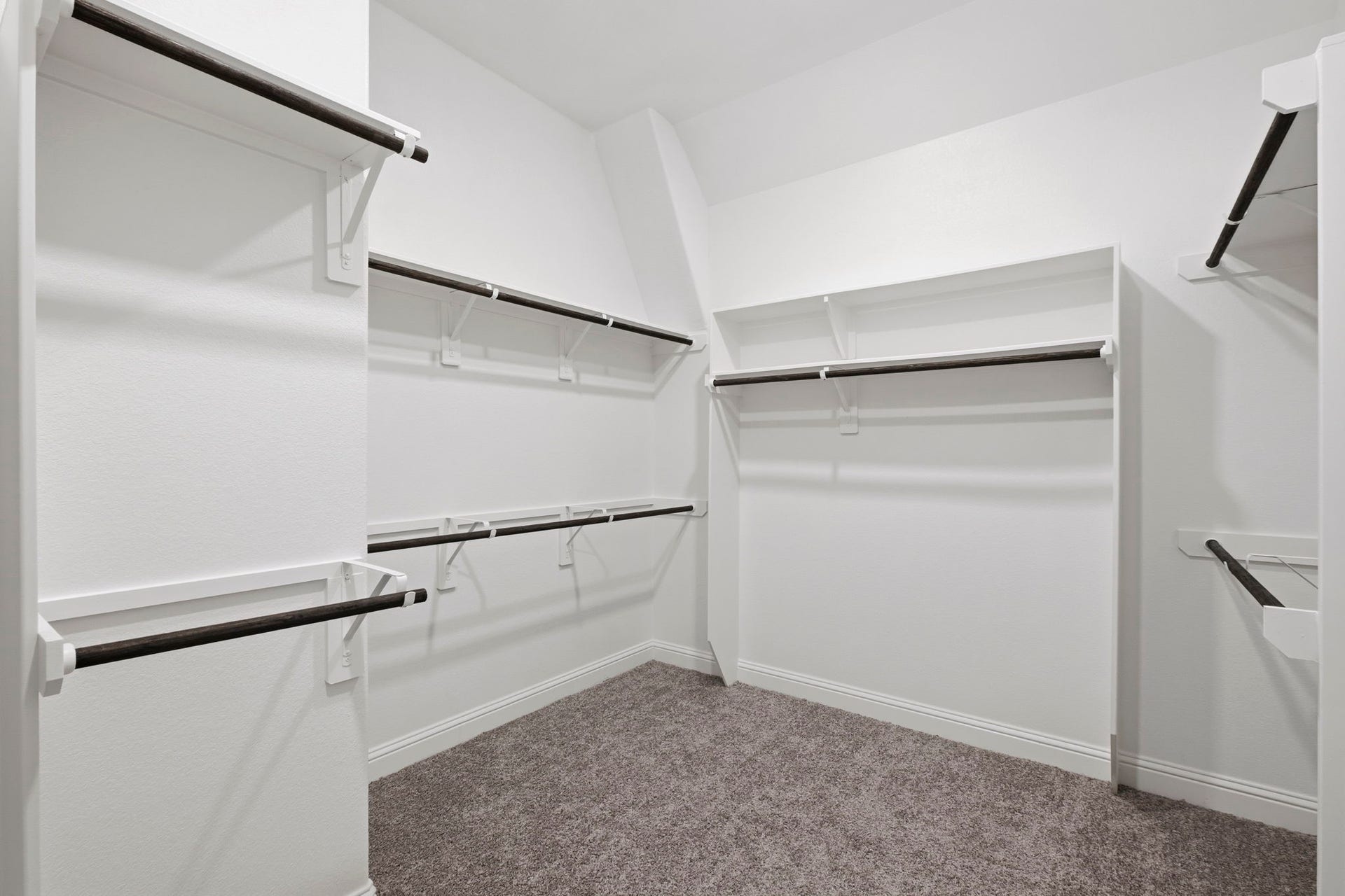 19314 Trotting Green Trail, Tomball, TX 77377 Primary bedroom closet has so much space, this is the only place you will see carpet in the entire house.