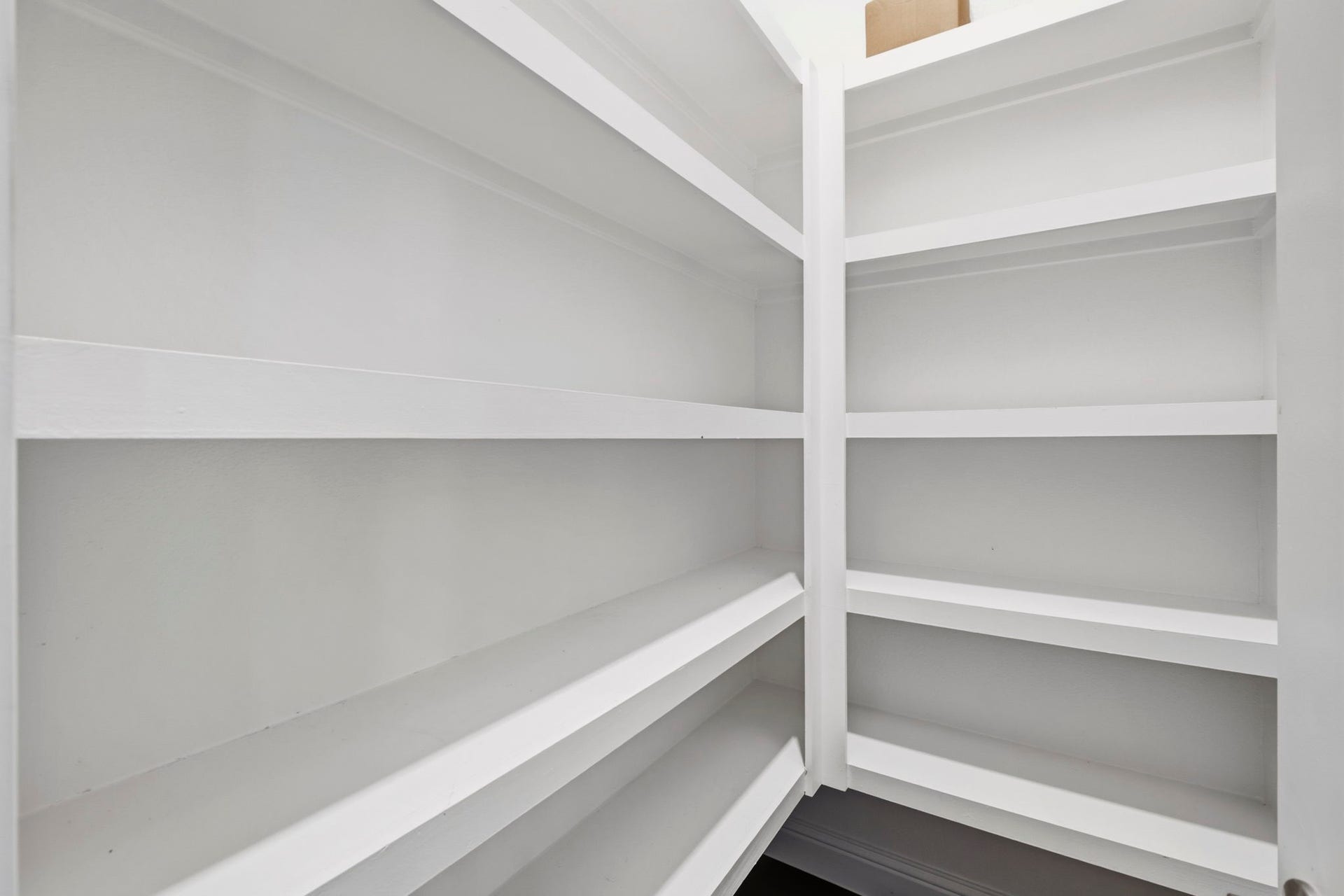 19314 Trotting Green Trail, Tomball, TX 77377 Kitchen pantry provides plenty of shelving