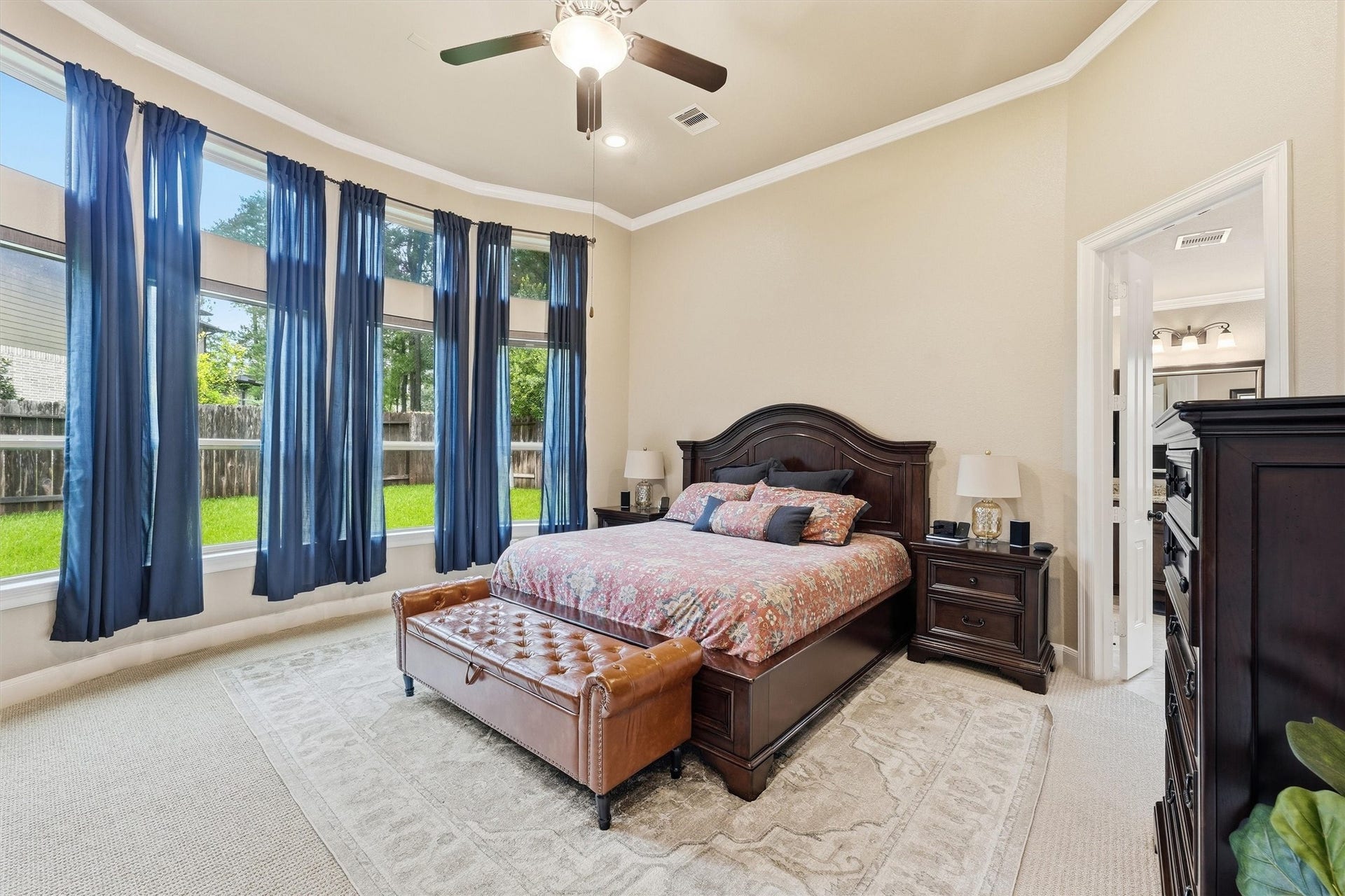 210 Fox Squirrel Court, Pinehurst, TX 77362 Spacious primary suite on the first floor.
