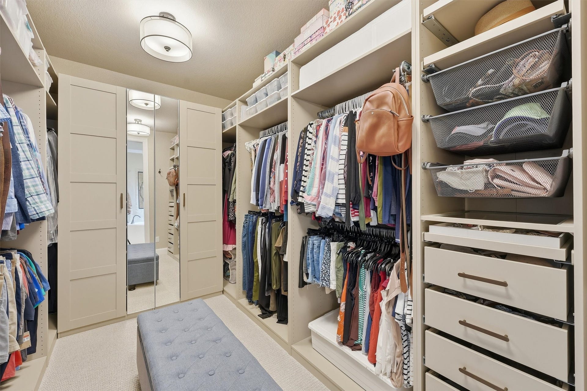 210 Fox Squirrel Court, Pinehurst, TX 77362 Expansive primary closet with excellent storage.