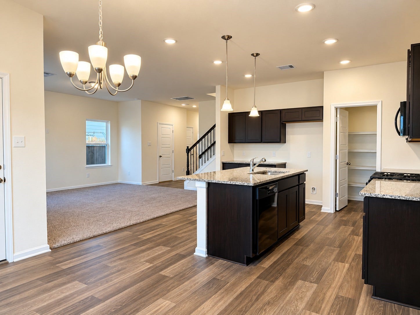 654 Cherry Tree Drive, La Marque, TX 77568 The Oriole II-Kitchen into Family Room