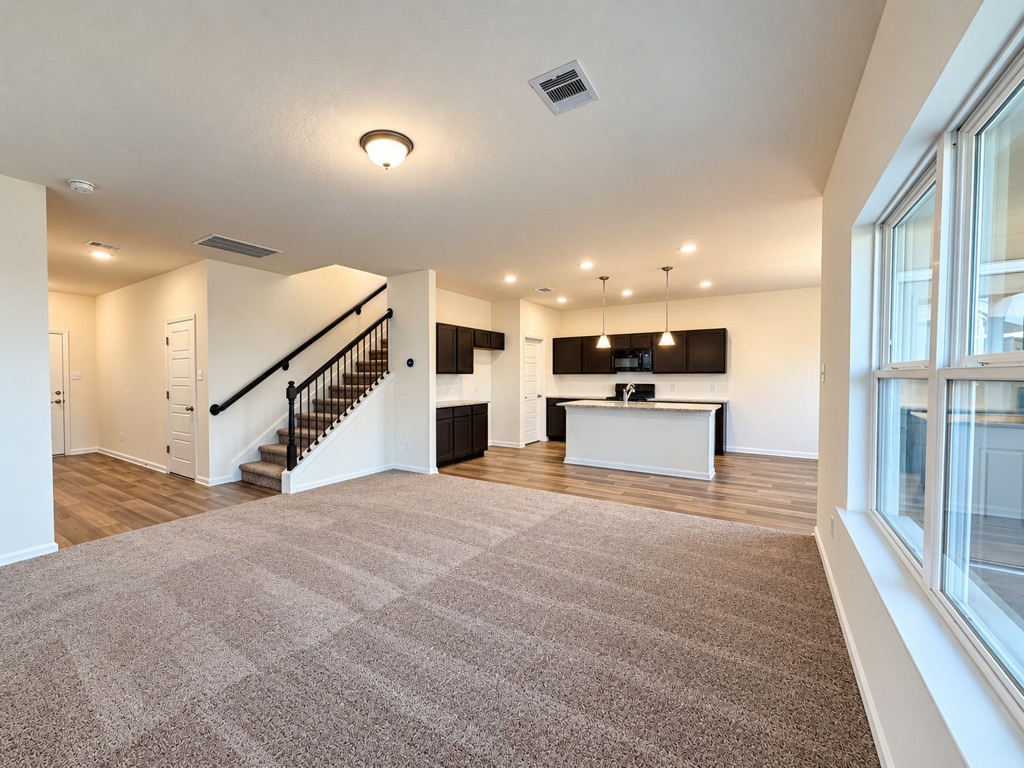 654 Cherry Tree Drive, La Marque, TX 77568 The Oriole II- Family Room into Kitchen
