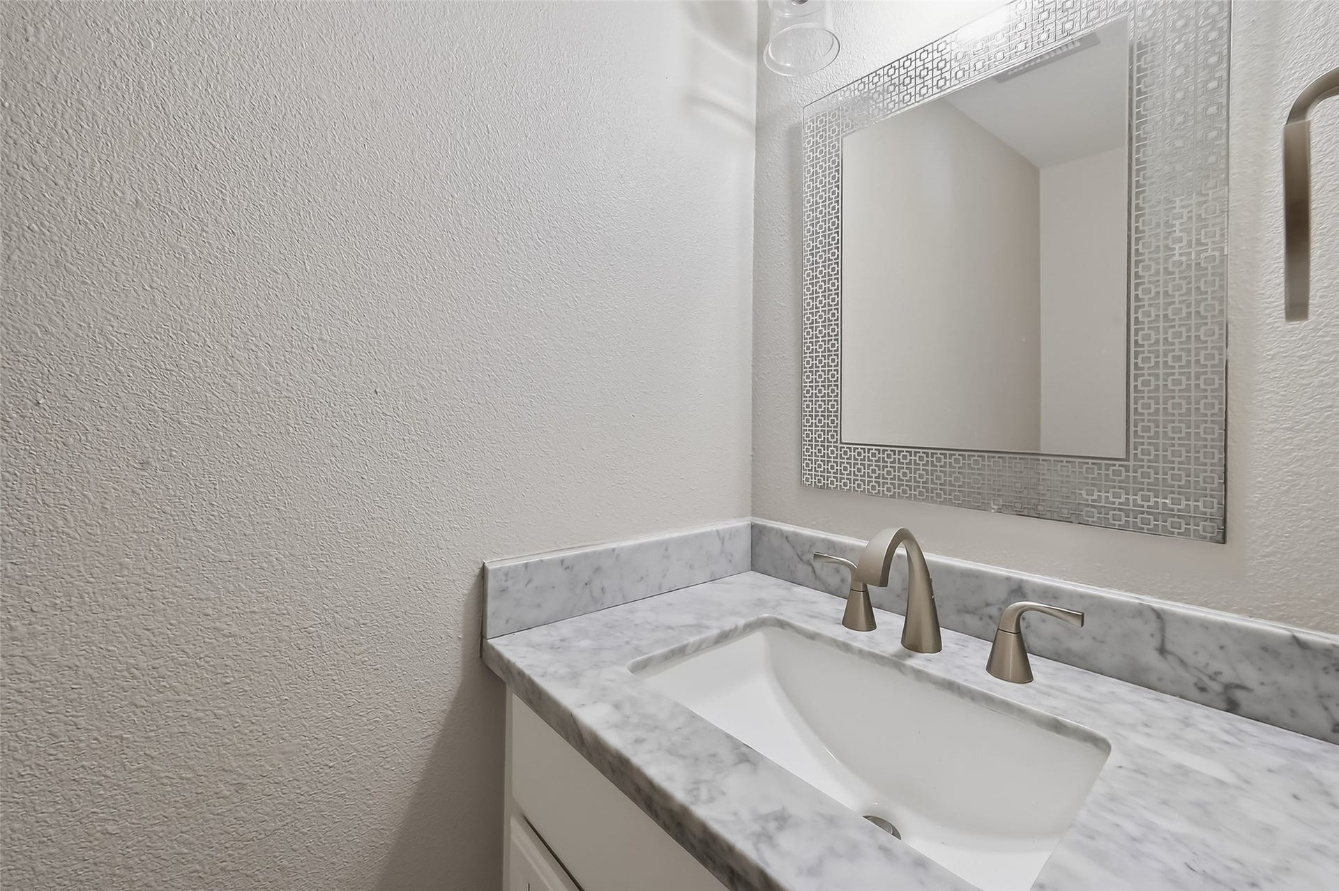6351 Briar Rose Drive, #149, Houston, TX 77057 Convenient first-floor powder bath with updated finishes and modern design details.