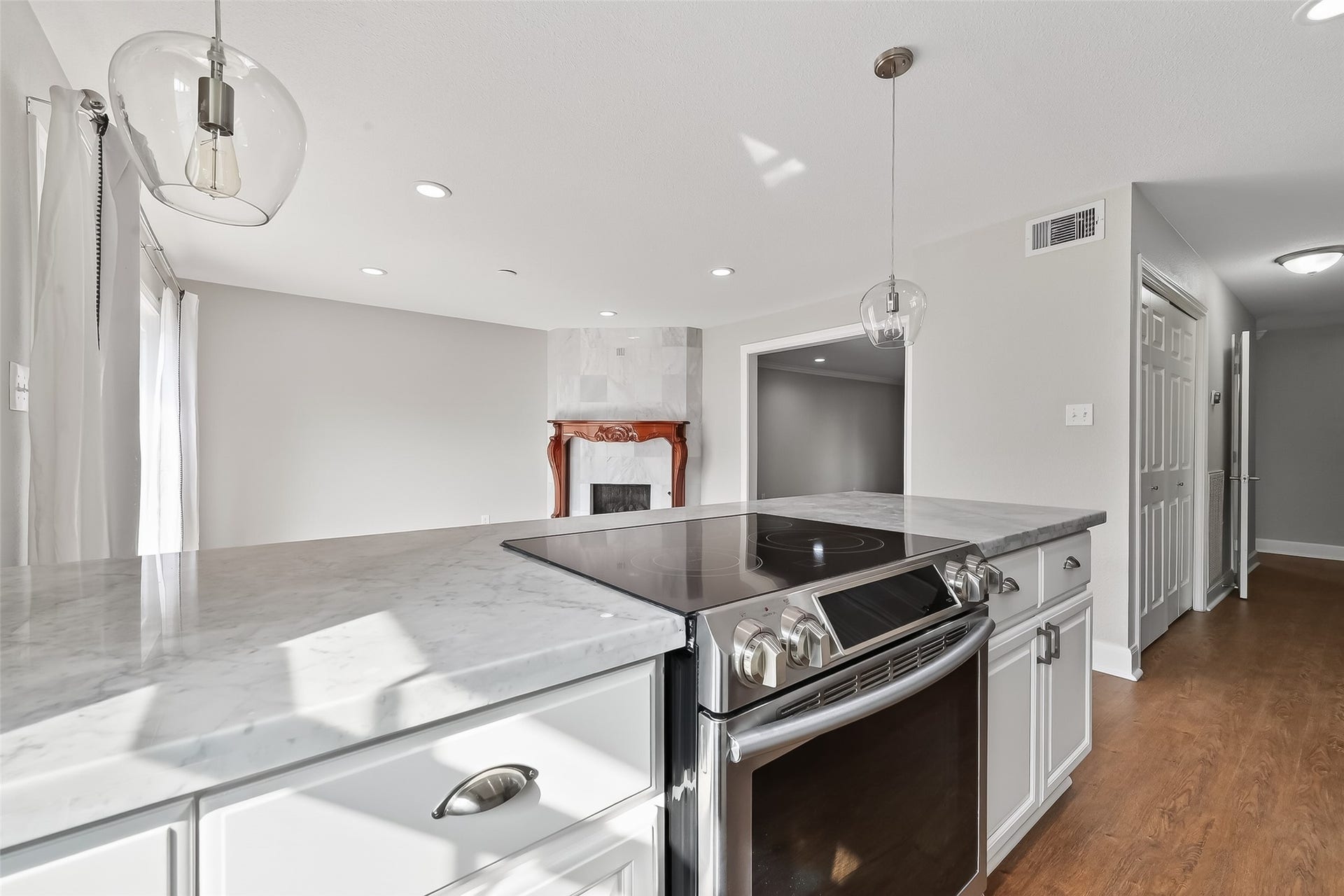 6351 Briar Rose Drive, #149, Houston, TX 77057 Bright kitchen with updated cabinetry, stainless steel appliances, and open flow to the living and dining spaces.