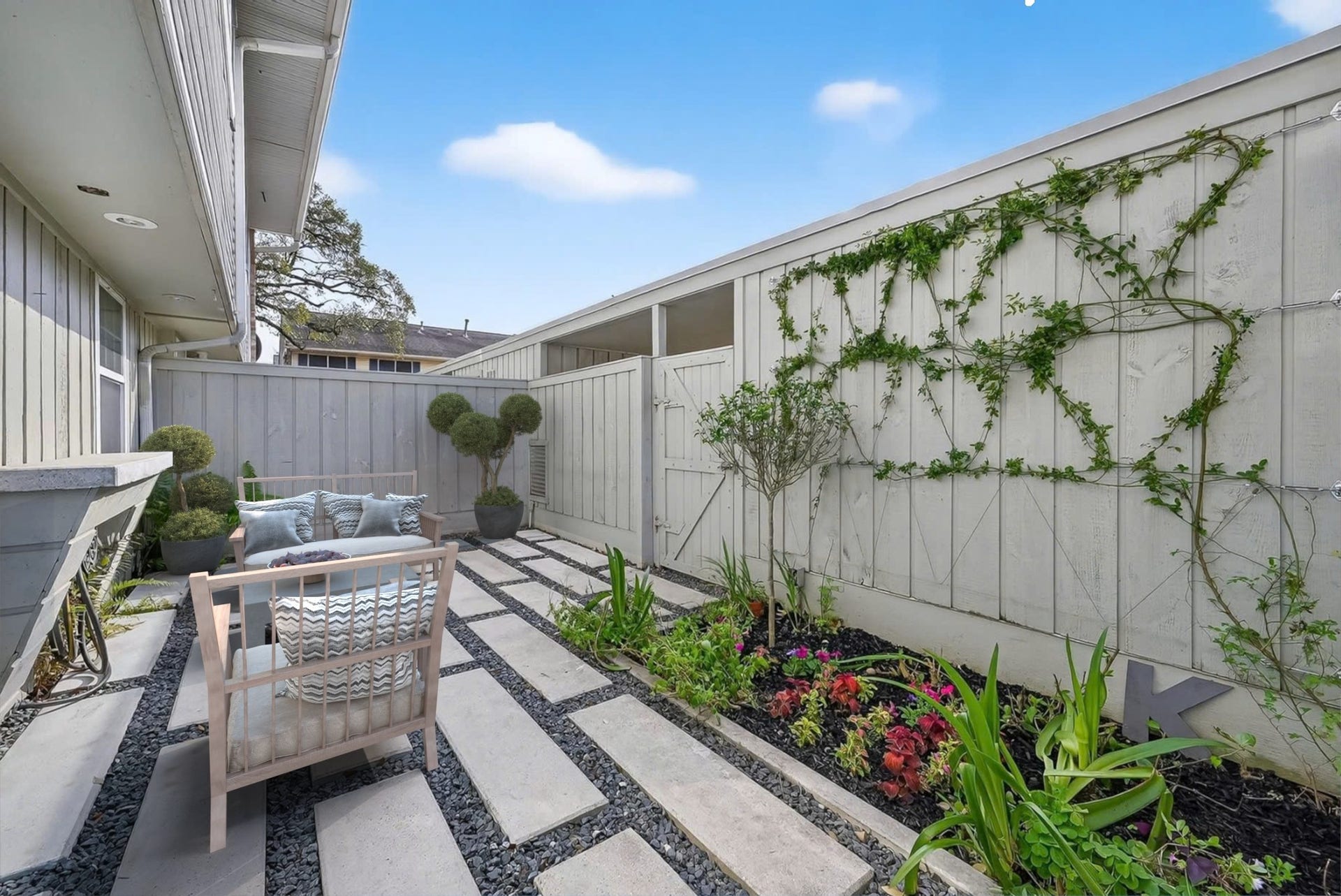 6351 Briar Rose Drive, #149, Houston, TX 77057 Beautiful outdoor patio space with modern upgrades and low-maintenance design in this Briar Grove townhome.