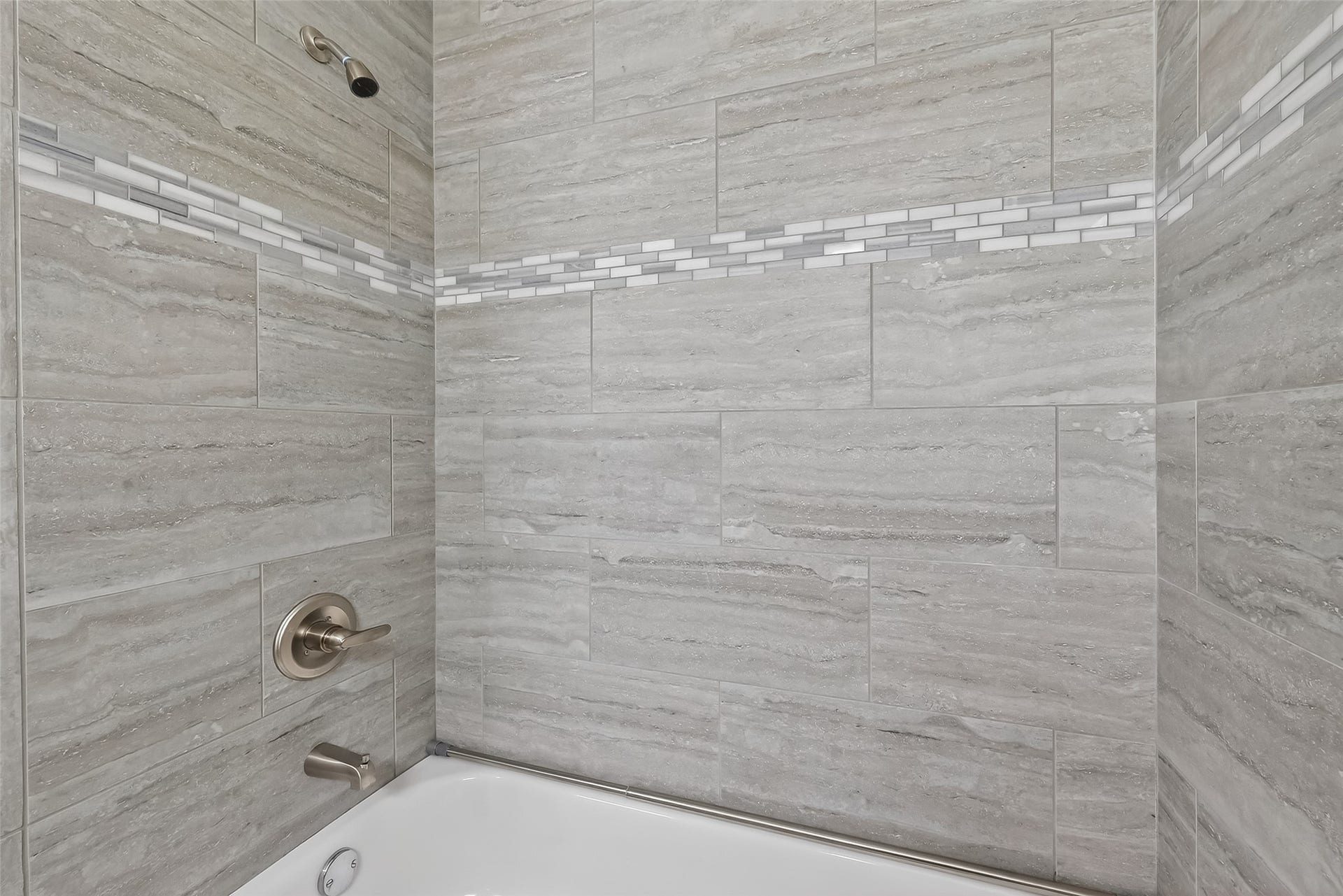 6351 Briar Rose Drive, #149, Houston, TX 77057 Updated secondary bathroom with modern finishes, upgraded countertops, and clean contemporary design.