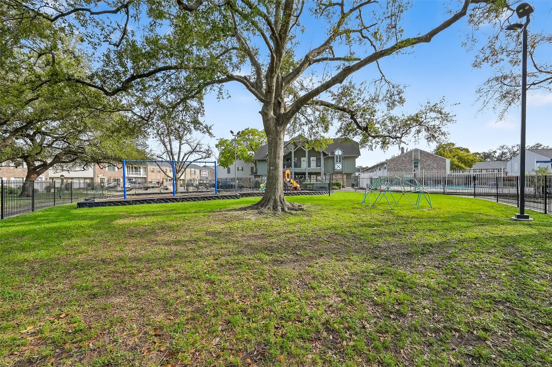 6351 Briar Rose Drive, #149, Houston, TX 77057 Neighborhood playground and green space within the Briar Grove Townhome community in Houston.