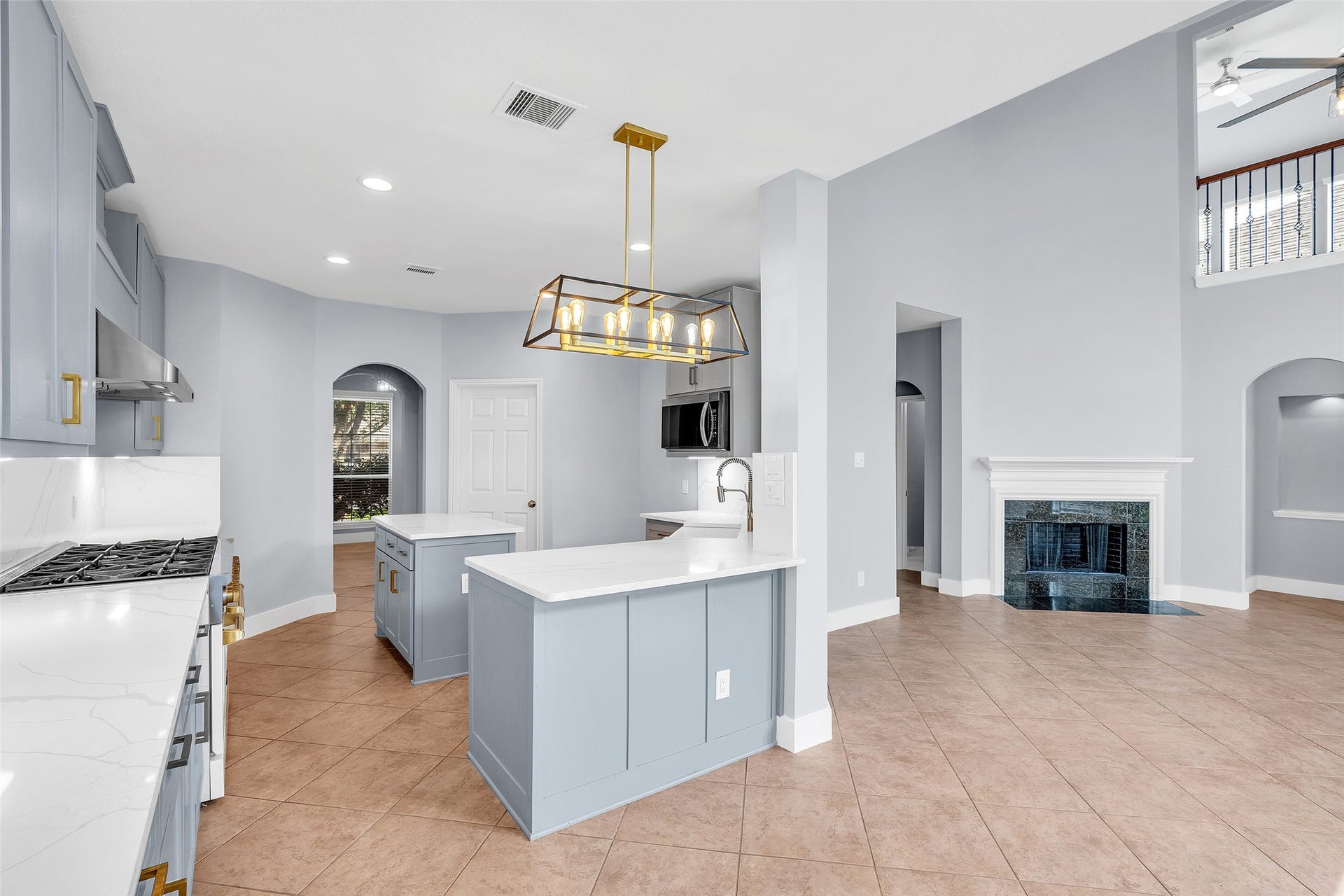 10626 Cortland Ridge Lane, Cypress, TX 77433 A generous sized island, modern appliances and a beautiful light fixture!
