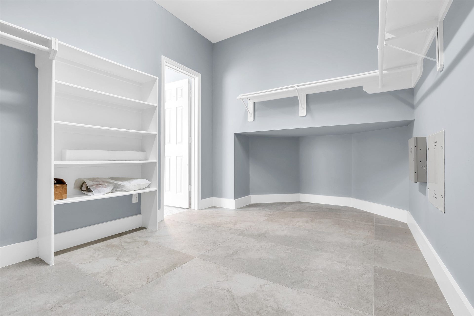 10626 Cortland Ridge Lane, Cypress, TX 77433 Discover the ultimate storage space with this massive primary walk-in closet, offering ample space and sleek shelving for all your wardrobe needs.