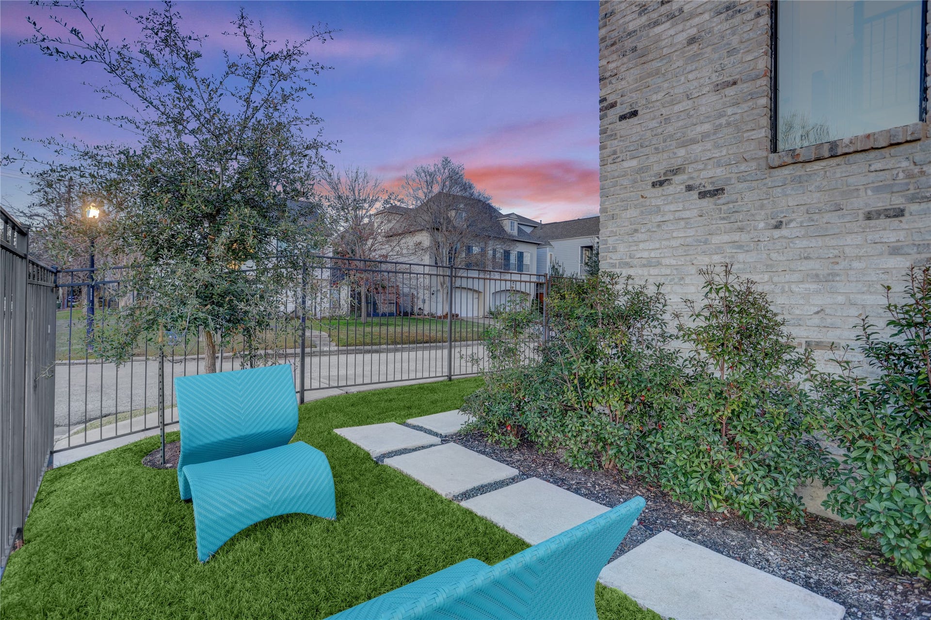 2435 Sheridan Street, Houston, TX 77030 Secure and private yard with elegant gating.