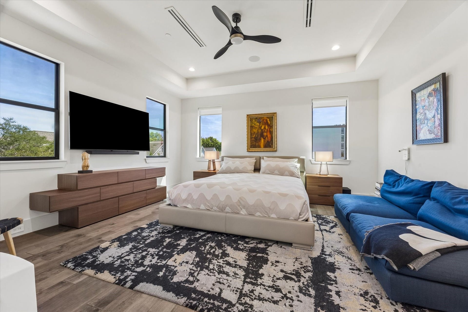2435 Sheridan Street, Houston, TX 77030 Serene primary bedroom featuring modern decor, ample natural light, and a cozy ambiance for ultimate relaxation.