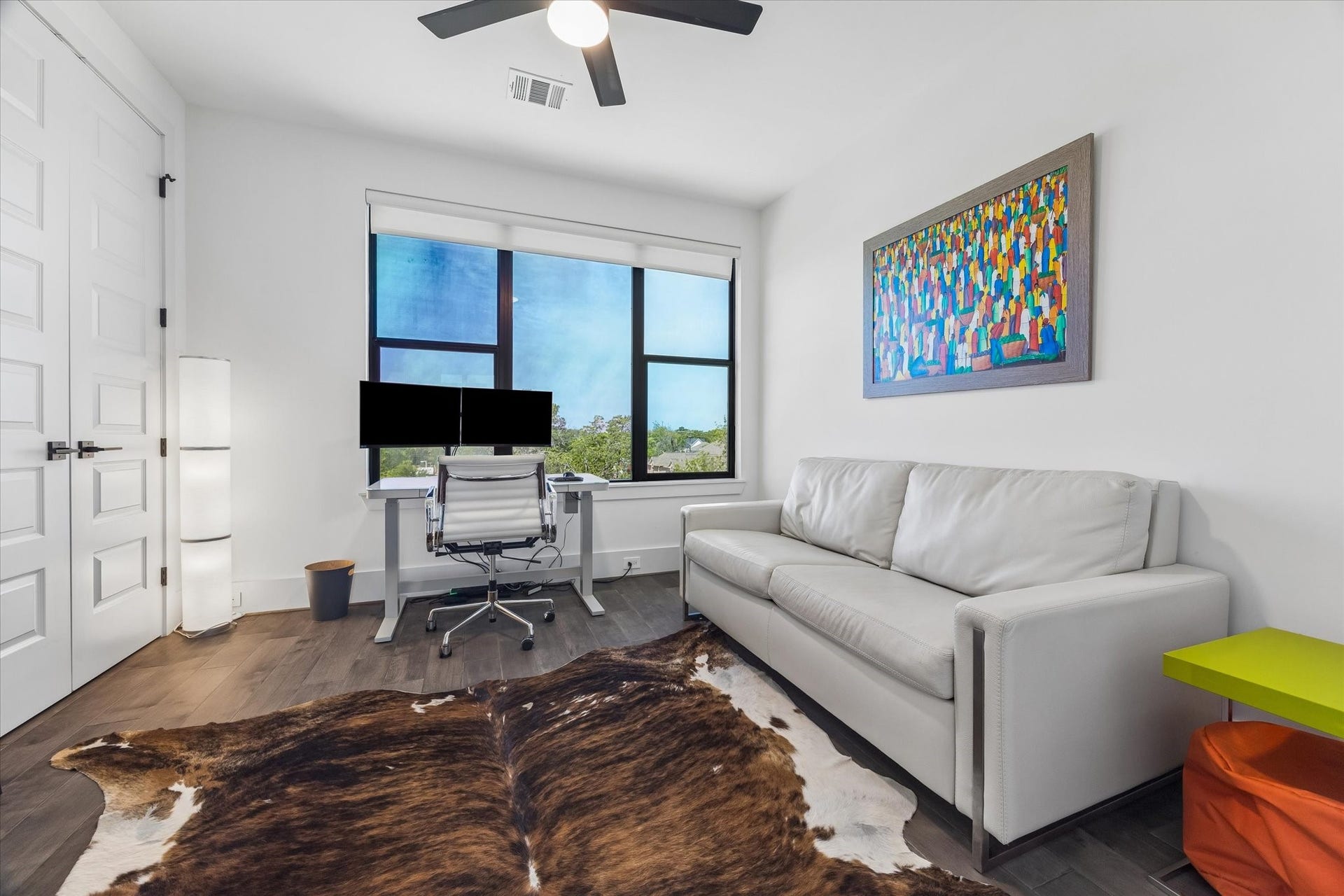 2435 Sheridan Street, Houston, TX 77030 Modern home office/secondary bedroom featuring ample natural light with a serene view.