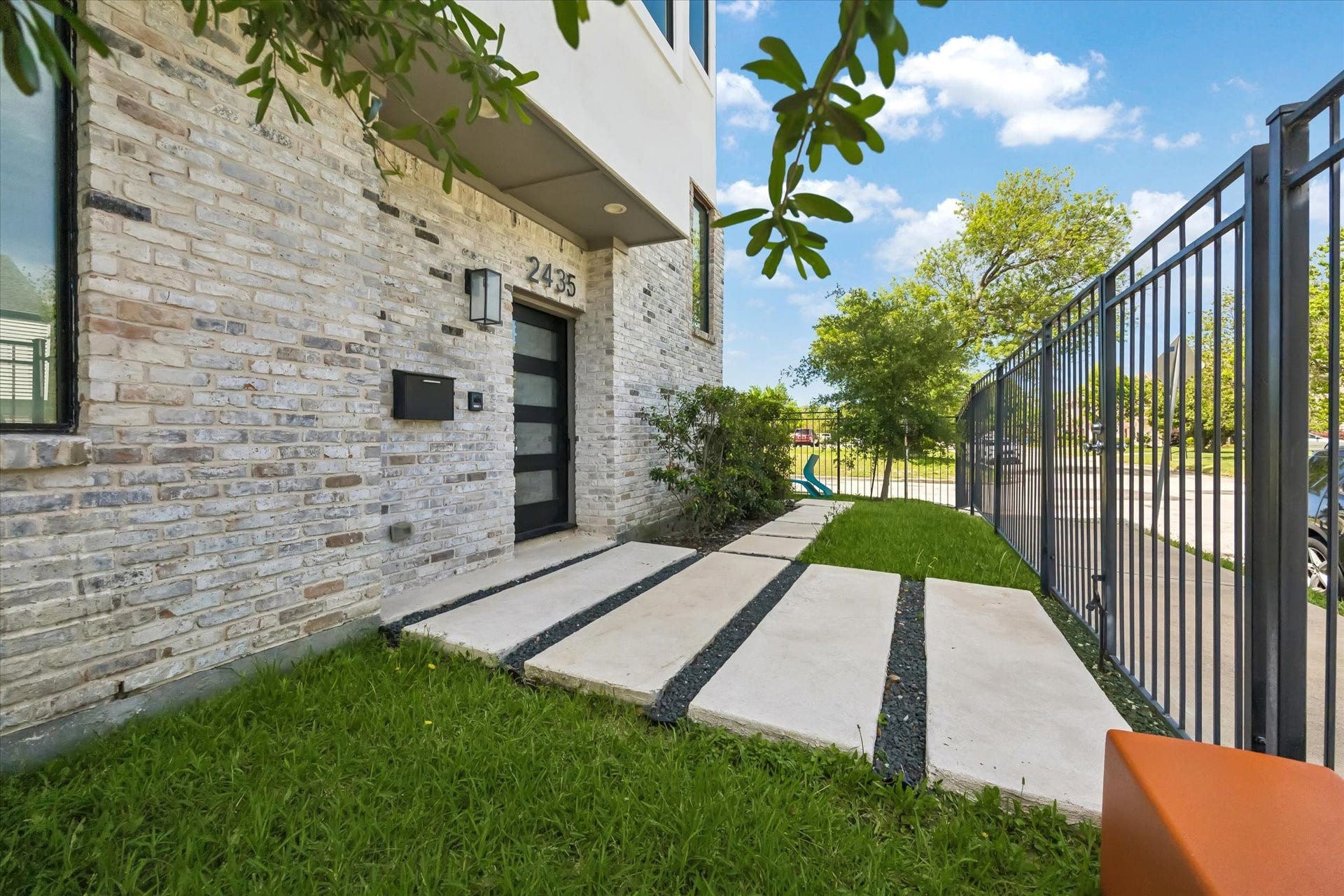 2435 Sheridan Street, Houston, TX 77030 Gated entrance and pavers welcome you into the home.