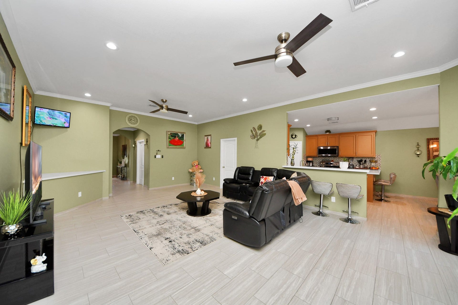 The living area opens toward the kitchen for easy flow.