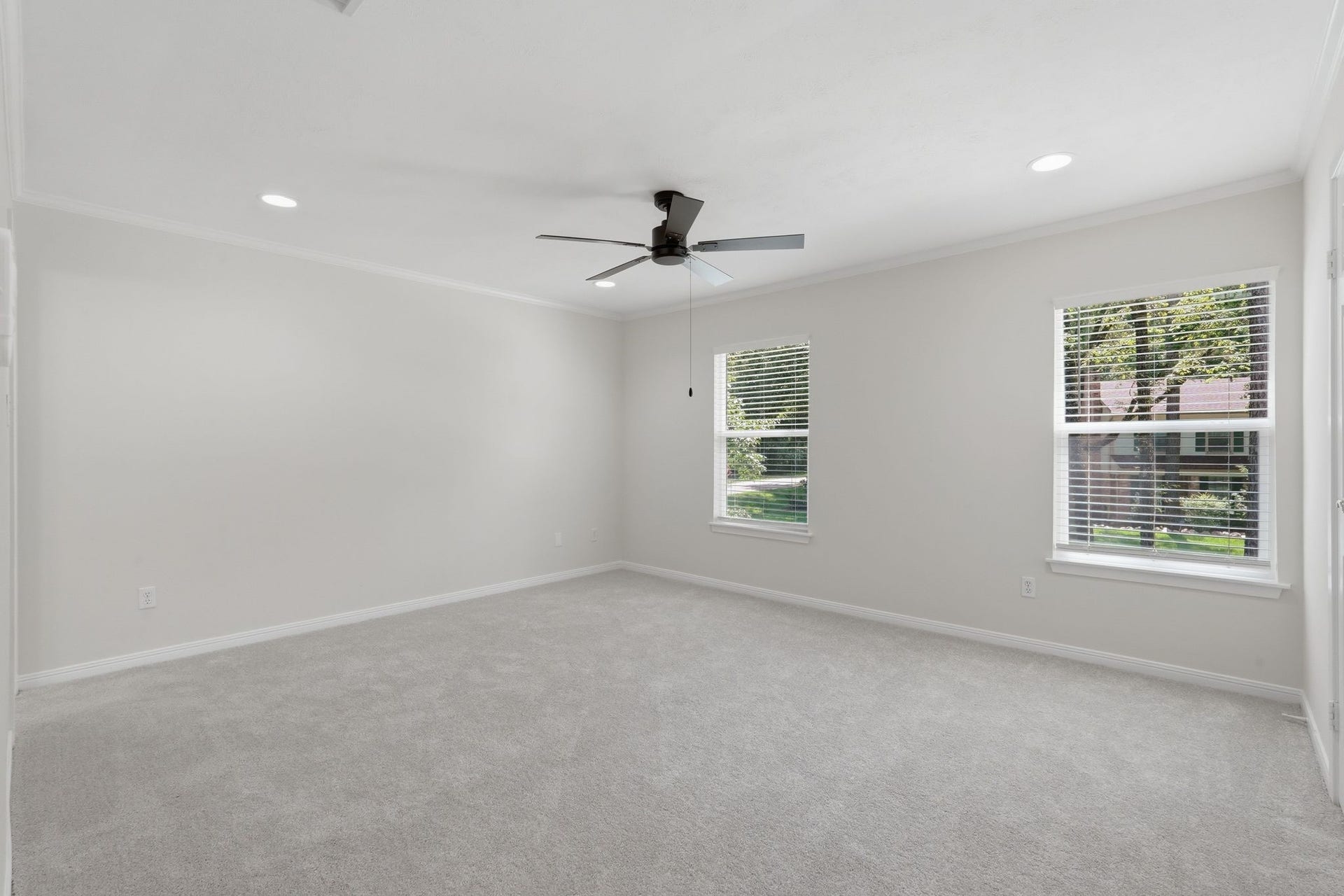 10916 Fawnlily Street, The Woodlands, TX 77380 At the end of the hallway to the right is your SECOND primary bedroom with plenty of space for large furniture and a walk in closet.